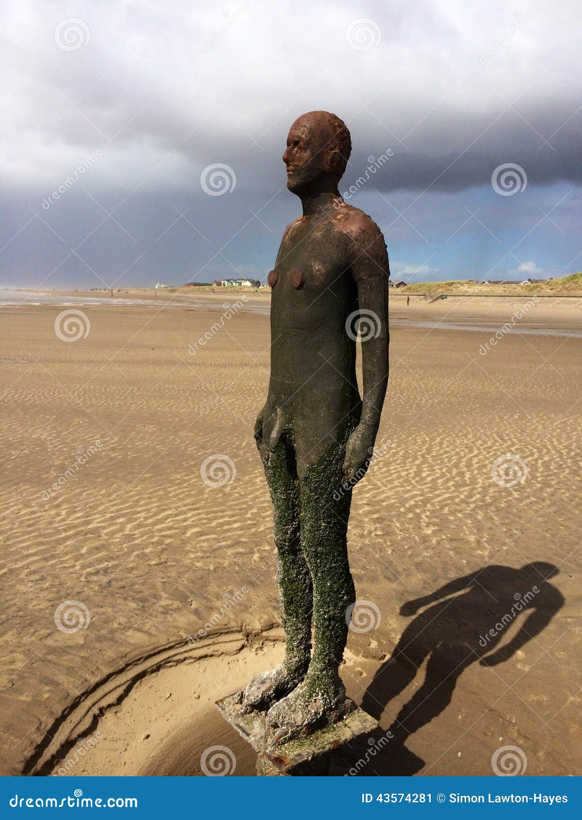 Bronze men on Crosby beach stock image. Image of male 43574281