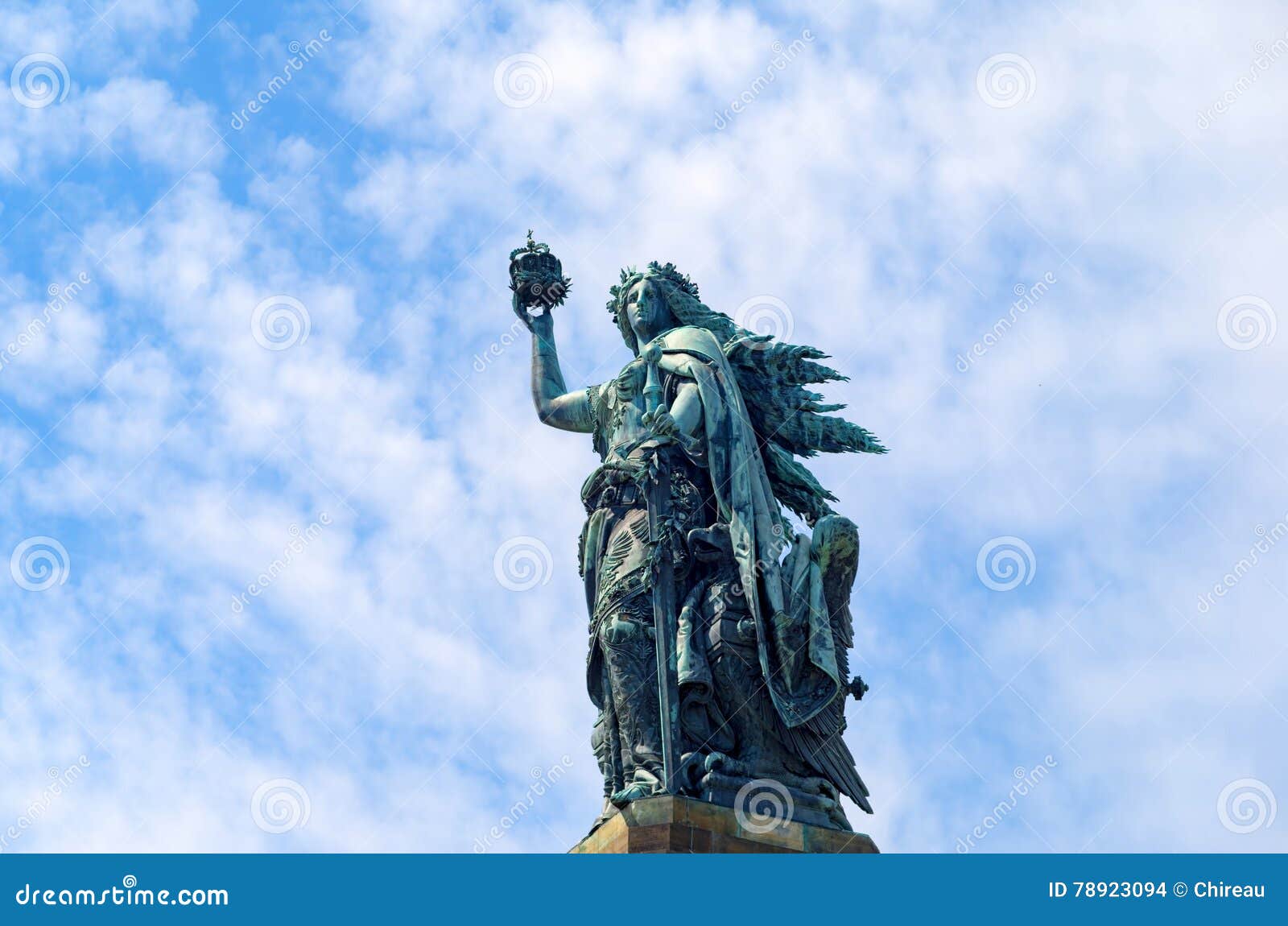 bronze sculpture: germania figure holding the crown of the emperor and the imperial sword