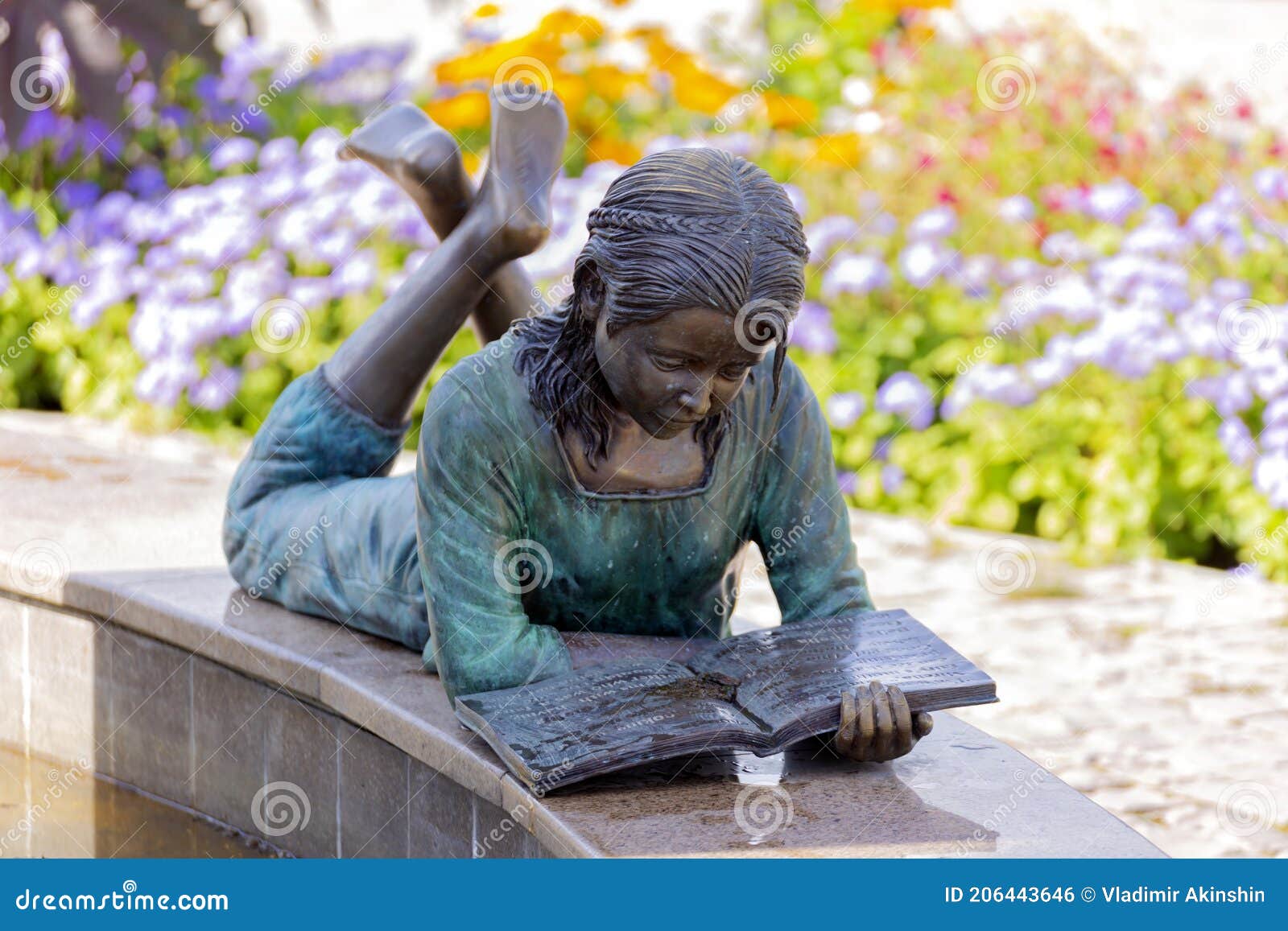 https://thumbs.dreamstime.com/z/bronze-sculpture-girl-lying-bench-reading-book-p-bazhova-summer-day-russia-zlatoust-august-206443646.jpg