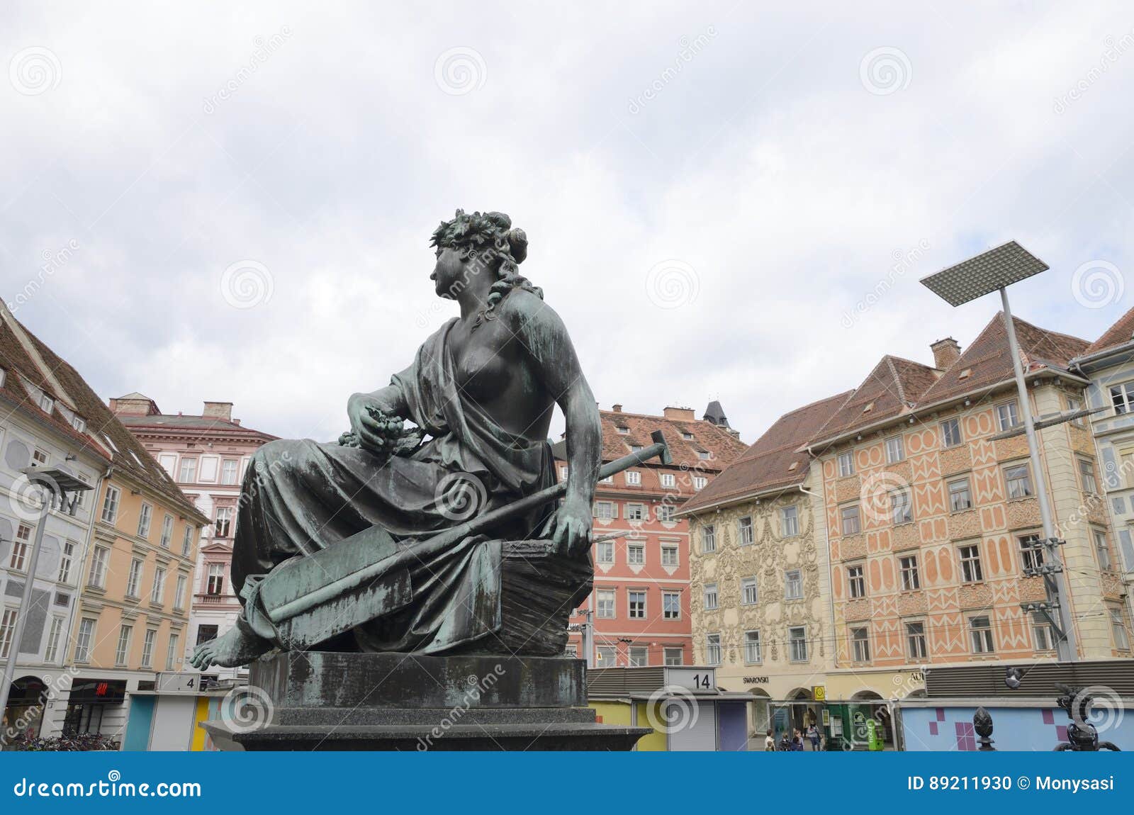 Bronze sculpture of woman. Bronze sculpture in the Main Square of Graz, the capital of federal state of Styria, Austria.