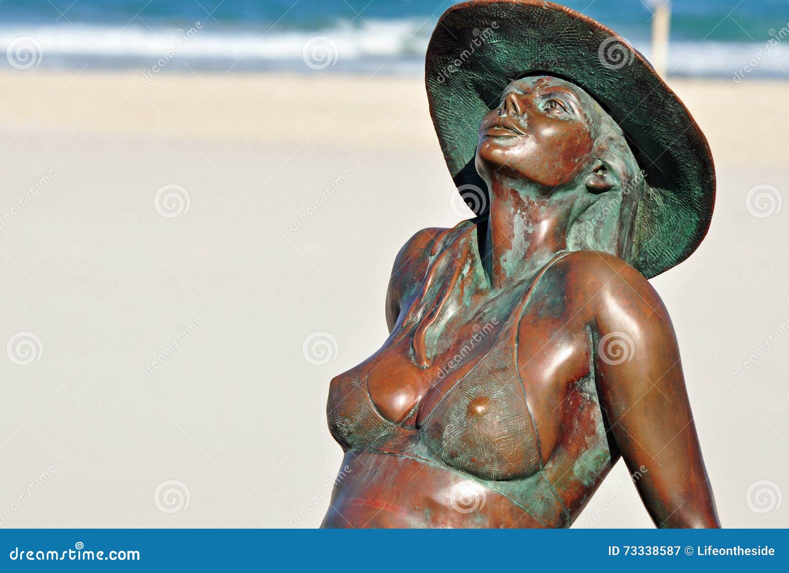 Bronzed Beautiful Bikini Girl Sunbathing on Beach Gold Coast Editorial Photography