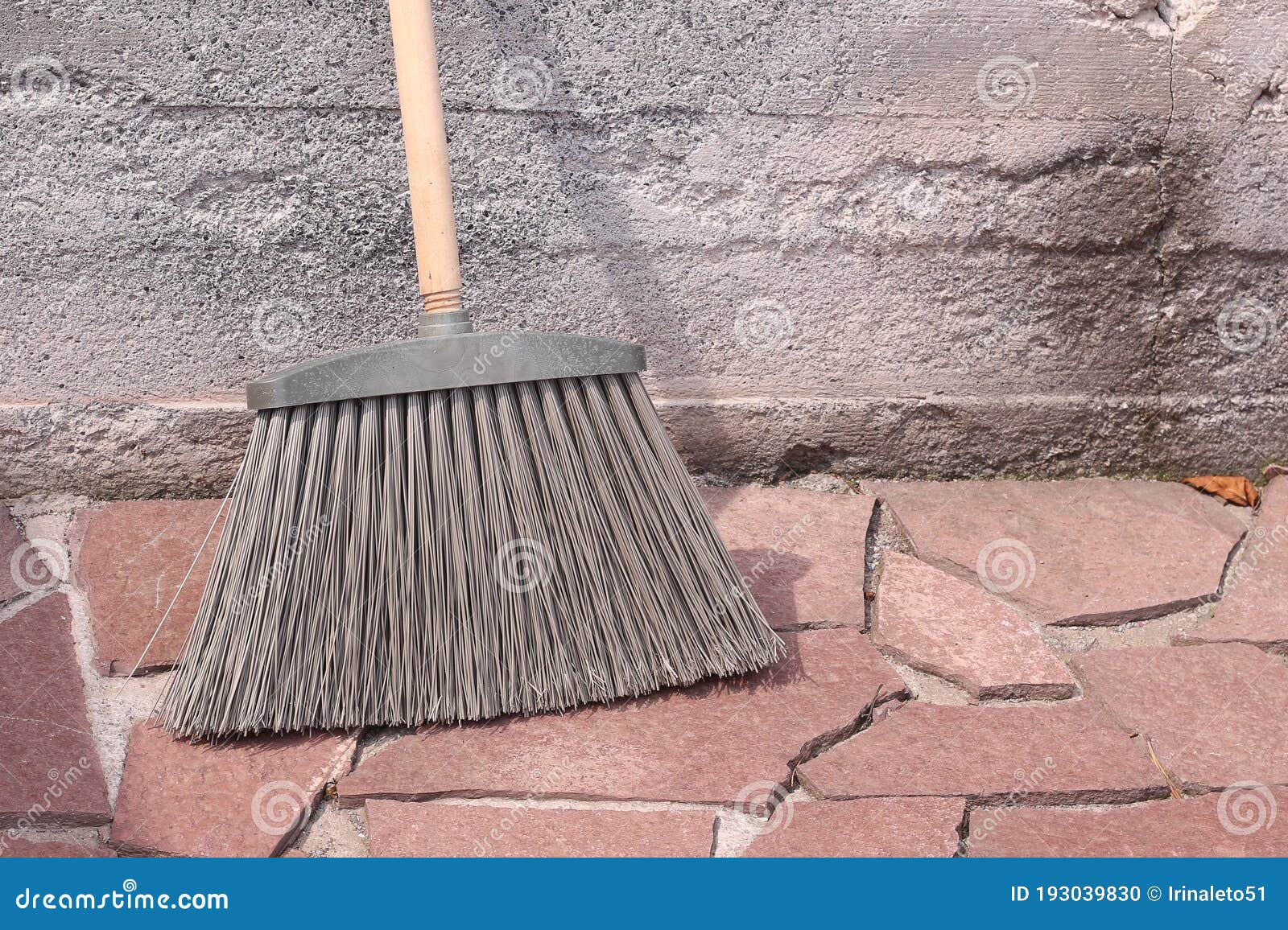 Broom with Hard Plastic Bristles on a Stone Surface Stock Photo Image