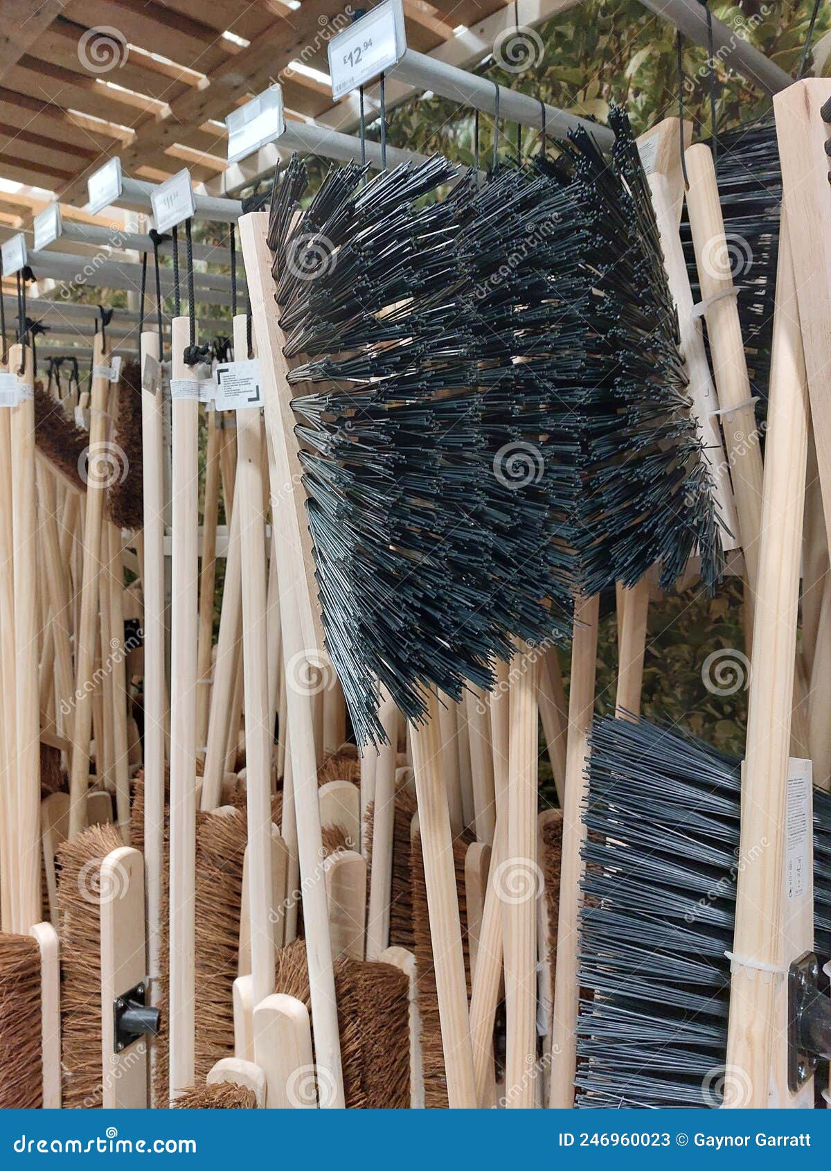 Brooms for sale in store stock image. Image of wood 246960023