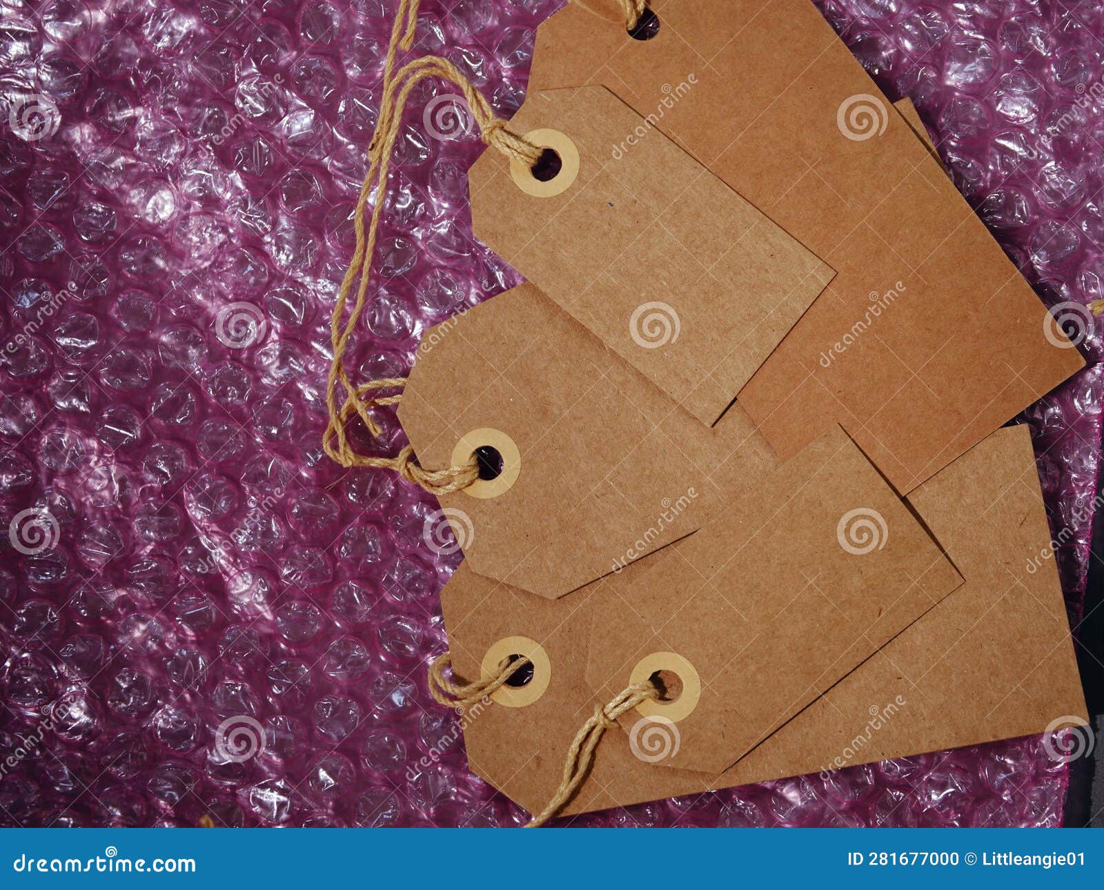 Brown Address Label Gift Tag and Bubble Wrap Background Medium Shot