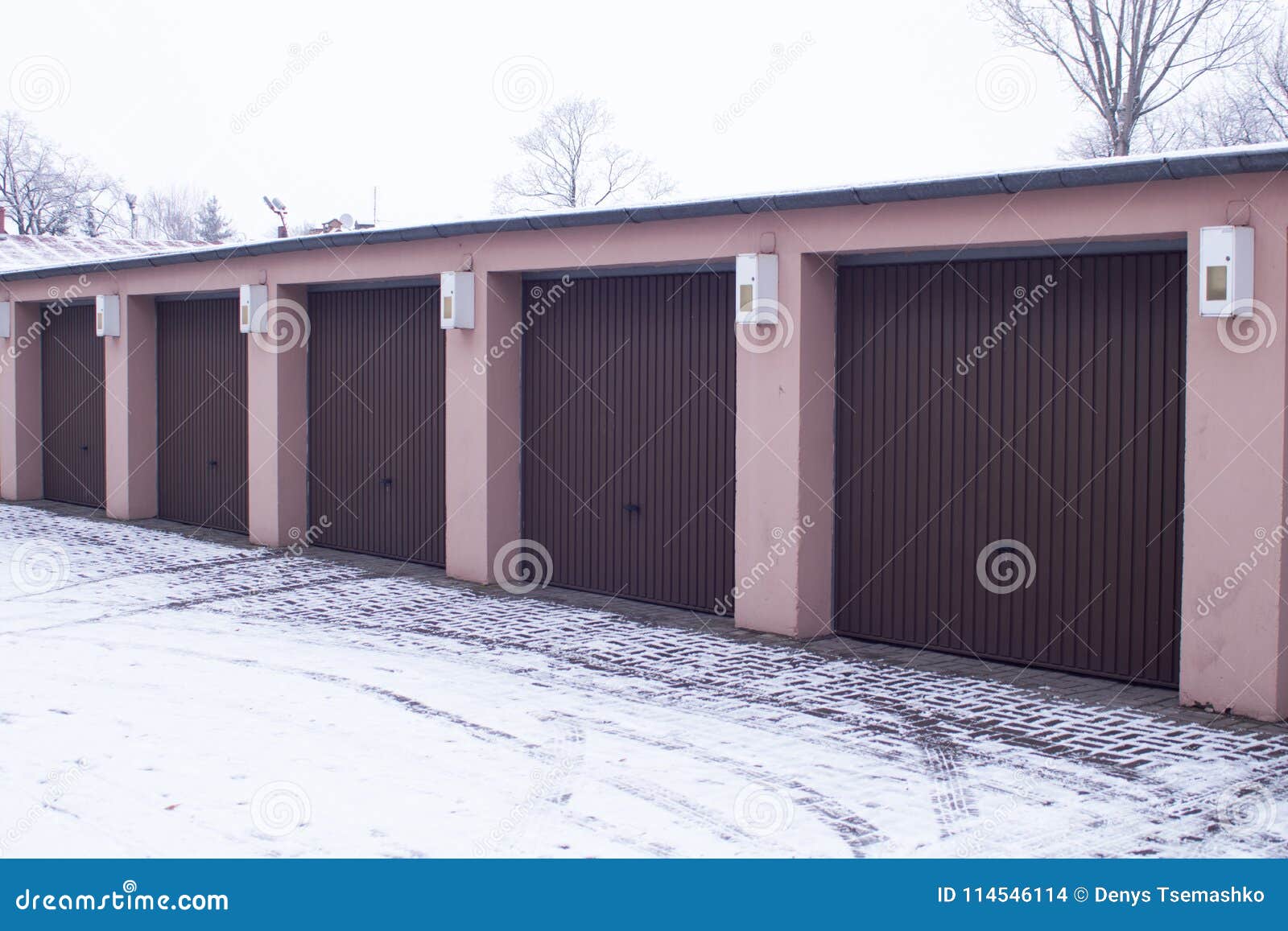 Brown Automatic Garage for Cars. for Three Places. Stock Photo Image
