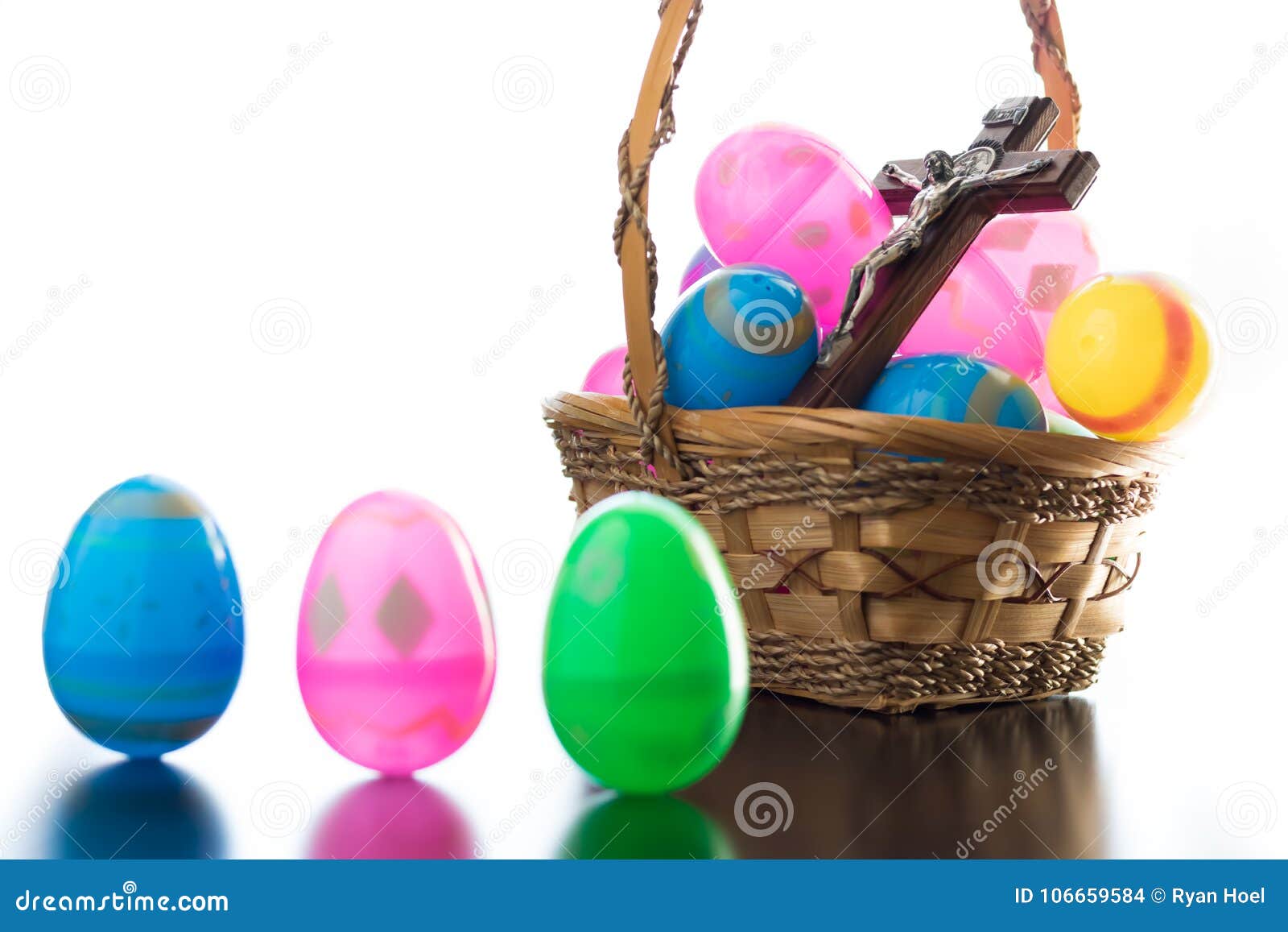 Decorated Easter Eggs are on a Table and in a Basket. Stock Photo