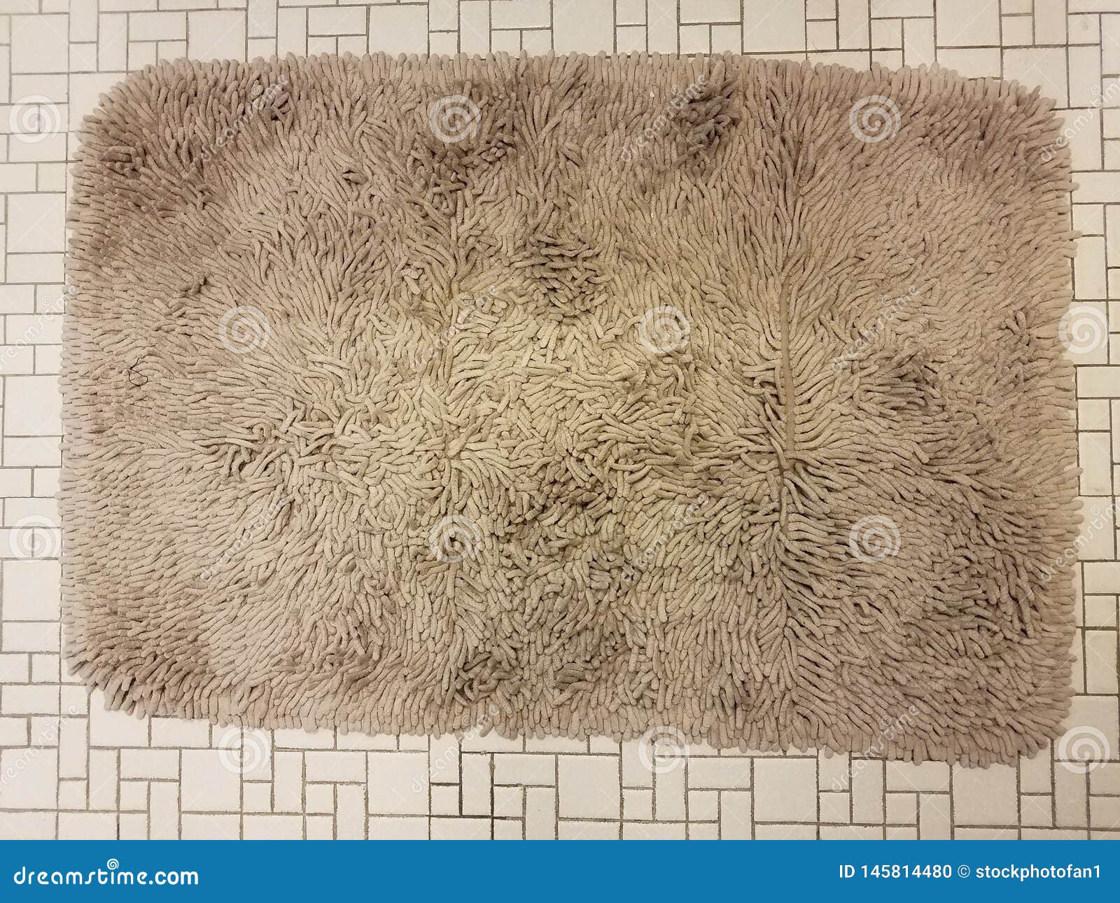 Brown Bathroom Carpet or Rug on White Tile Floor Stock Photo Image of