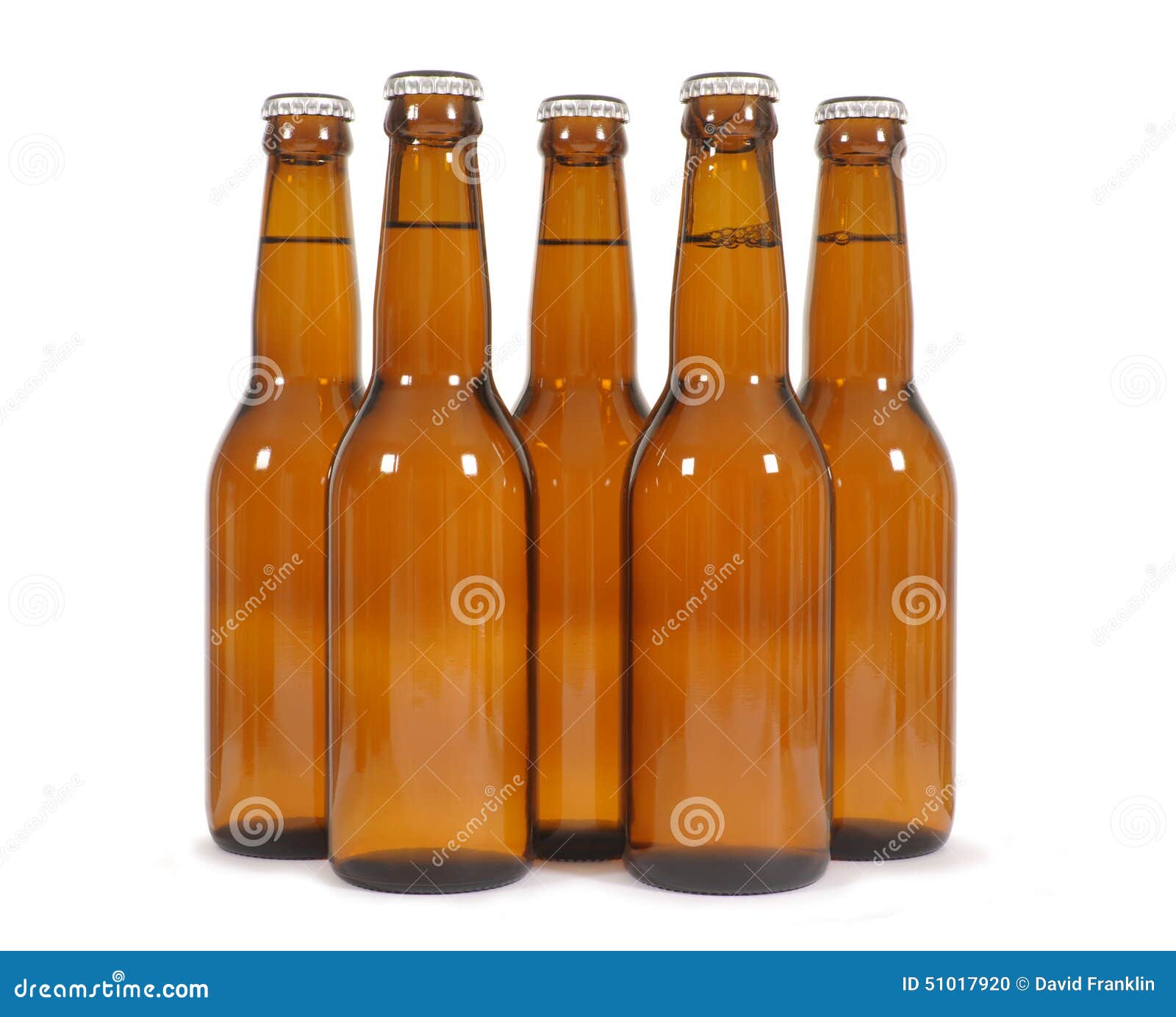 Row of Brown Beer Bottles Isolated on White Background Stock Photo