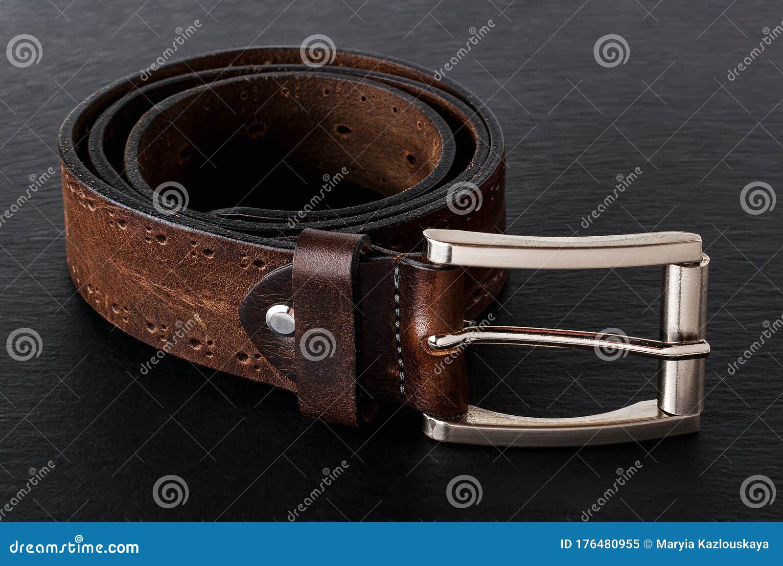 Brown Belt Made of Genuine Leather with Classic Metal Buckle on a Black ...