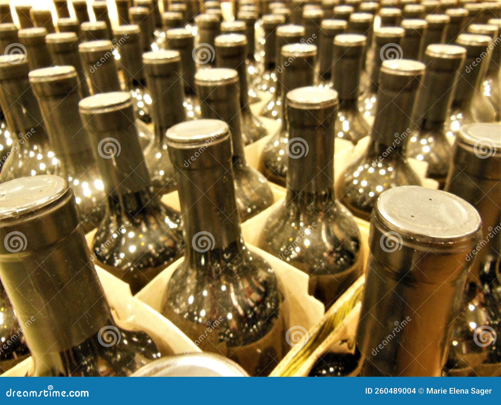 Brown Bottles in Rows stock photo. Image of drink, bottle 260489004