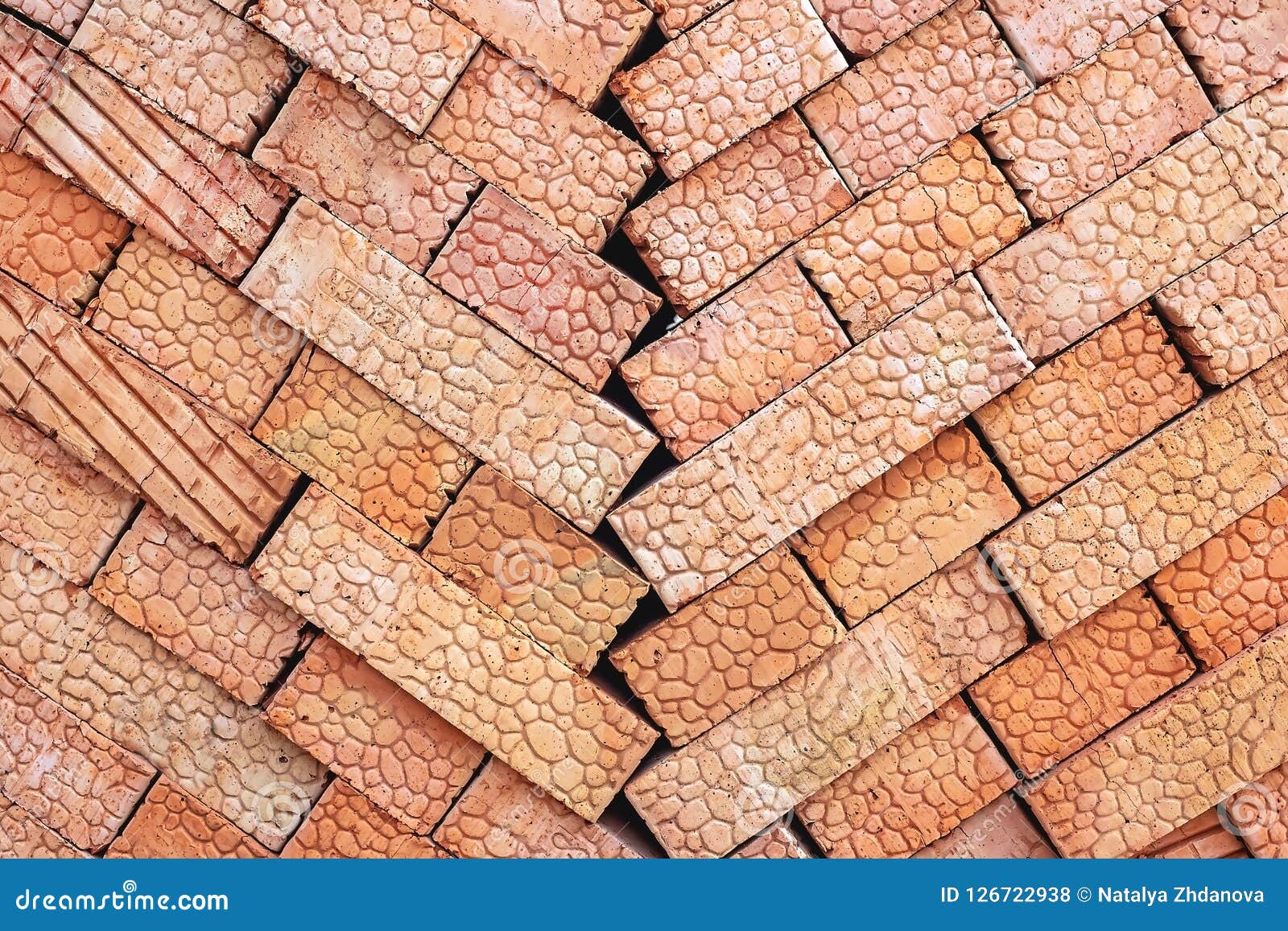 Brown Bricks Folded into a Pile, a Background from Bricks. Stock Photo Image of brick
