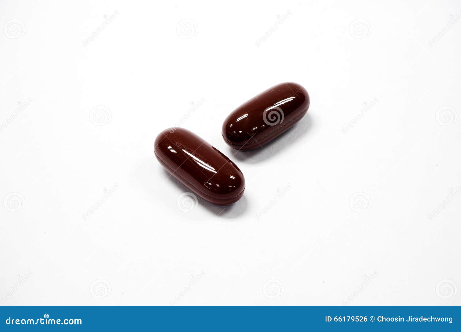 Brown capsule stock photo. Image of science, white, color 66179526