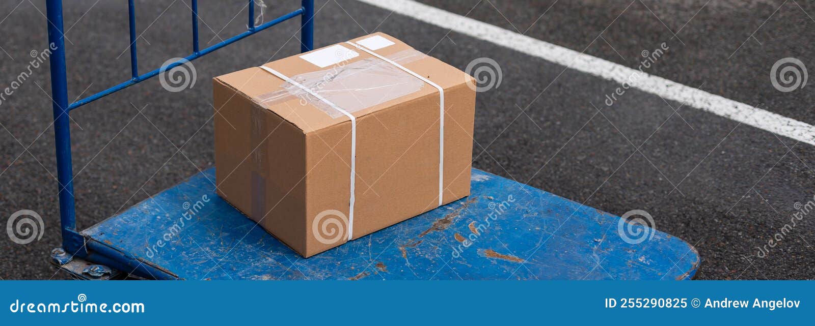 Brown Cardboard Moving Box in the Cart Stock Image Image of shipping