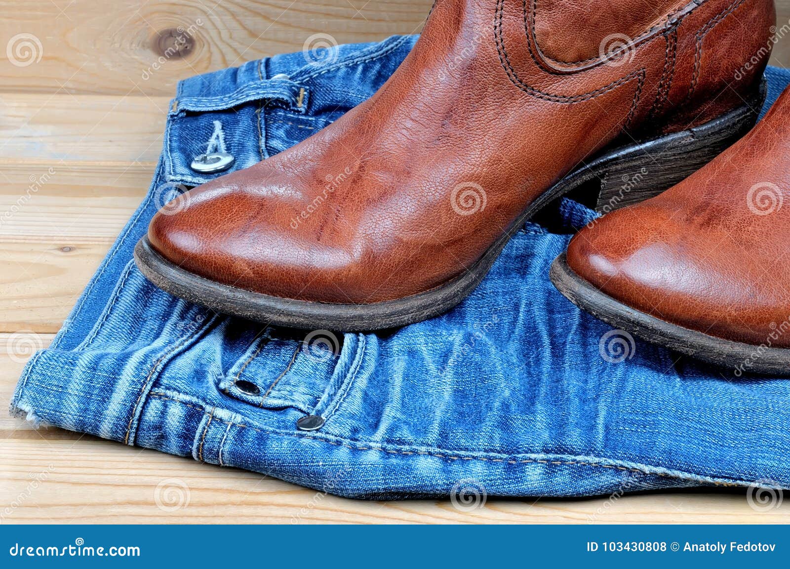 Brown Cowboy Boots on Blue Jeans Stock Photo Image of casual, ranch 103430808