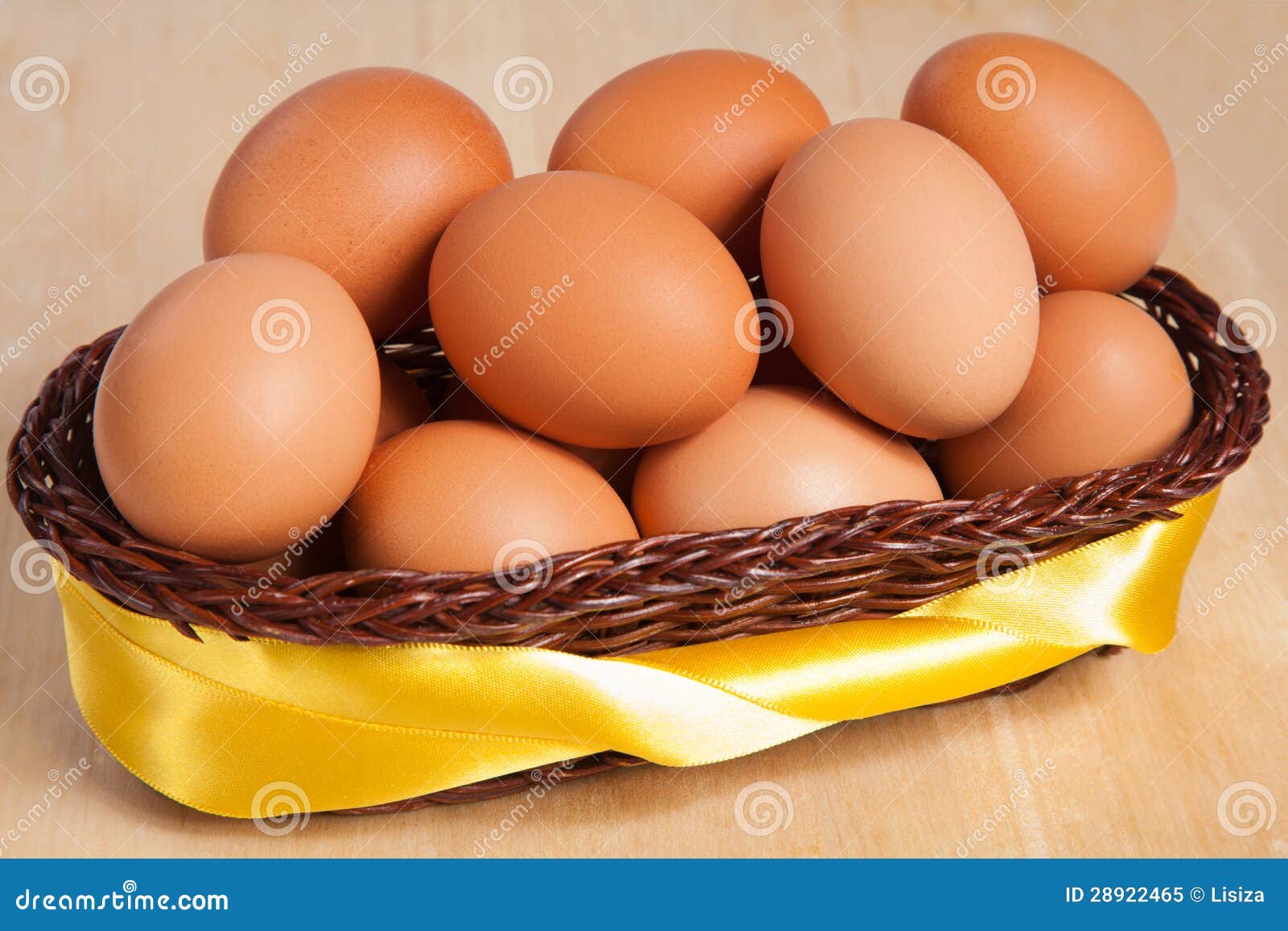 Brown Eggs in Basket with Yellow Ribbon Stock Image Image of yellow