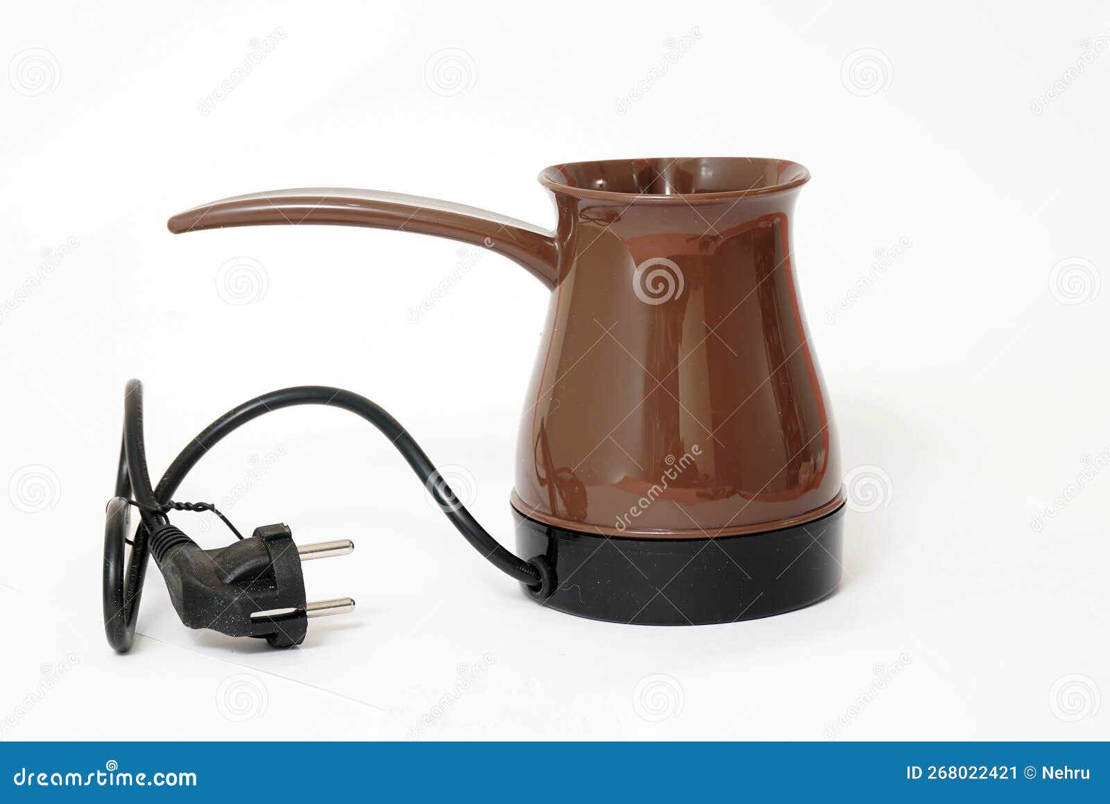 Brown Electric Coffee Maker for Making Turkish Coffee. Coffee Pot Stock
