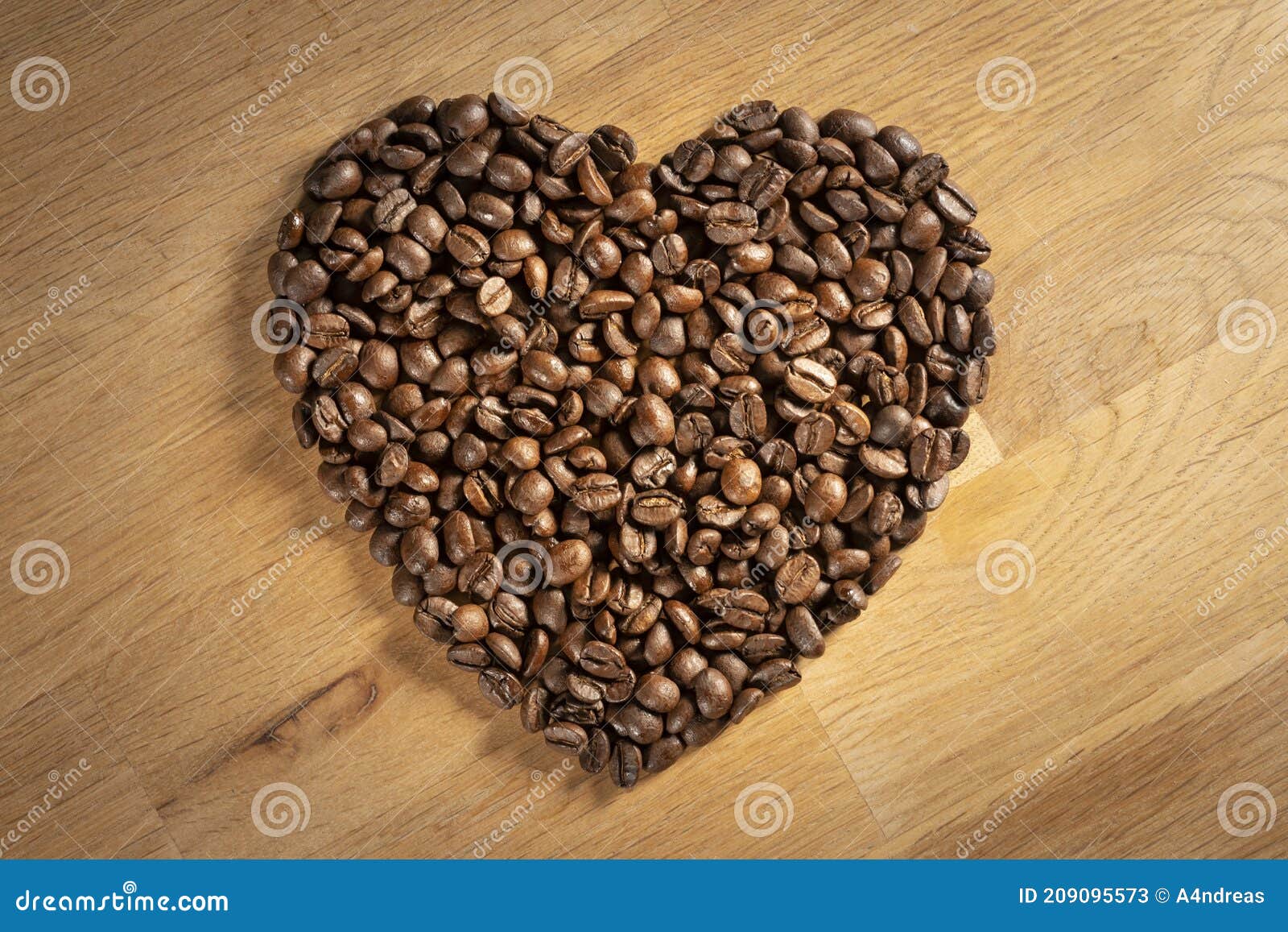 brown freshly roasted coffee beans d into a love heart