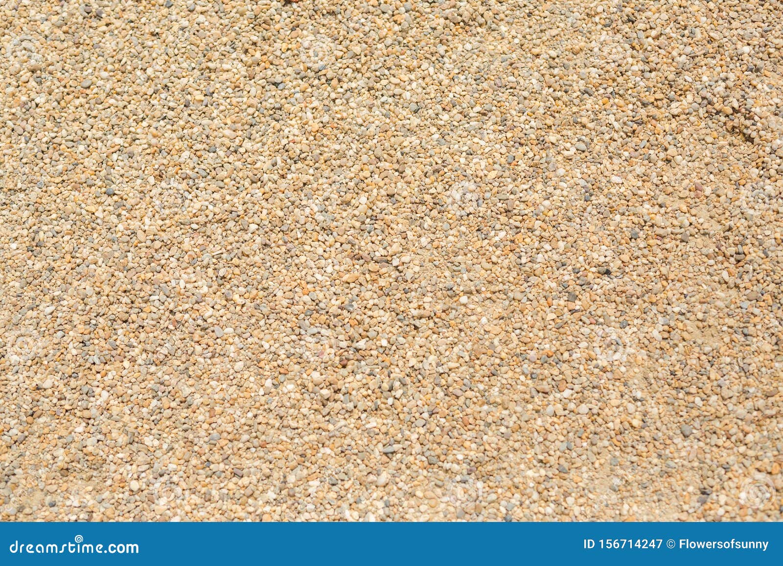 tiny gravel texture on brown concrete wall in sunny day
