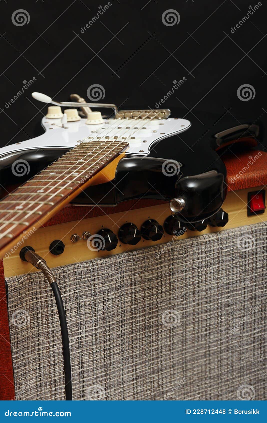 Guitar Tube Combo With Black Electric Guitar On Black Background