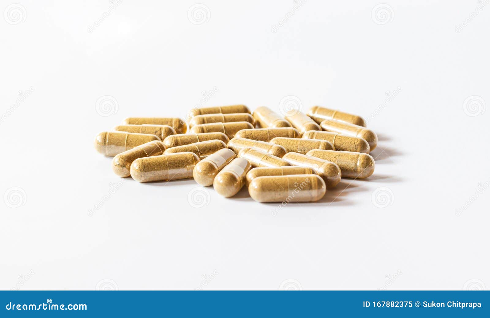 brown herbal capsules on a white background