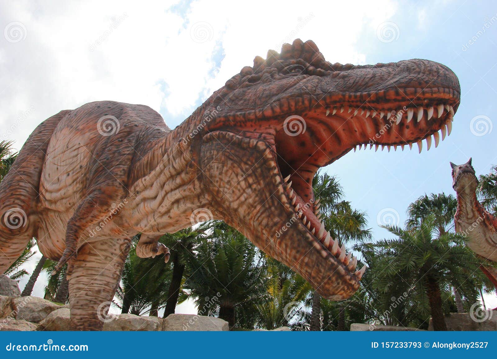 Huge Dinosaur Statue on the Rock Stock Image Image of cute, human