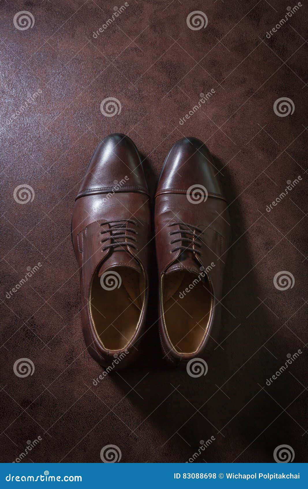 Brown Leather Men Shoes on Leather Background, Above Shot Stock Photo ...