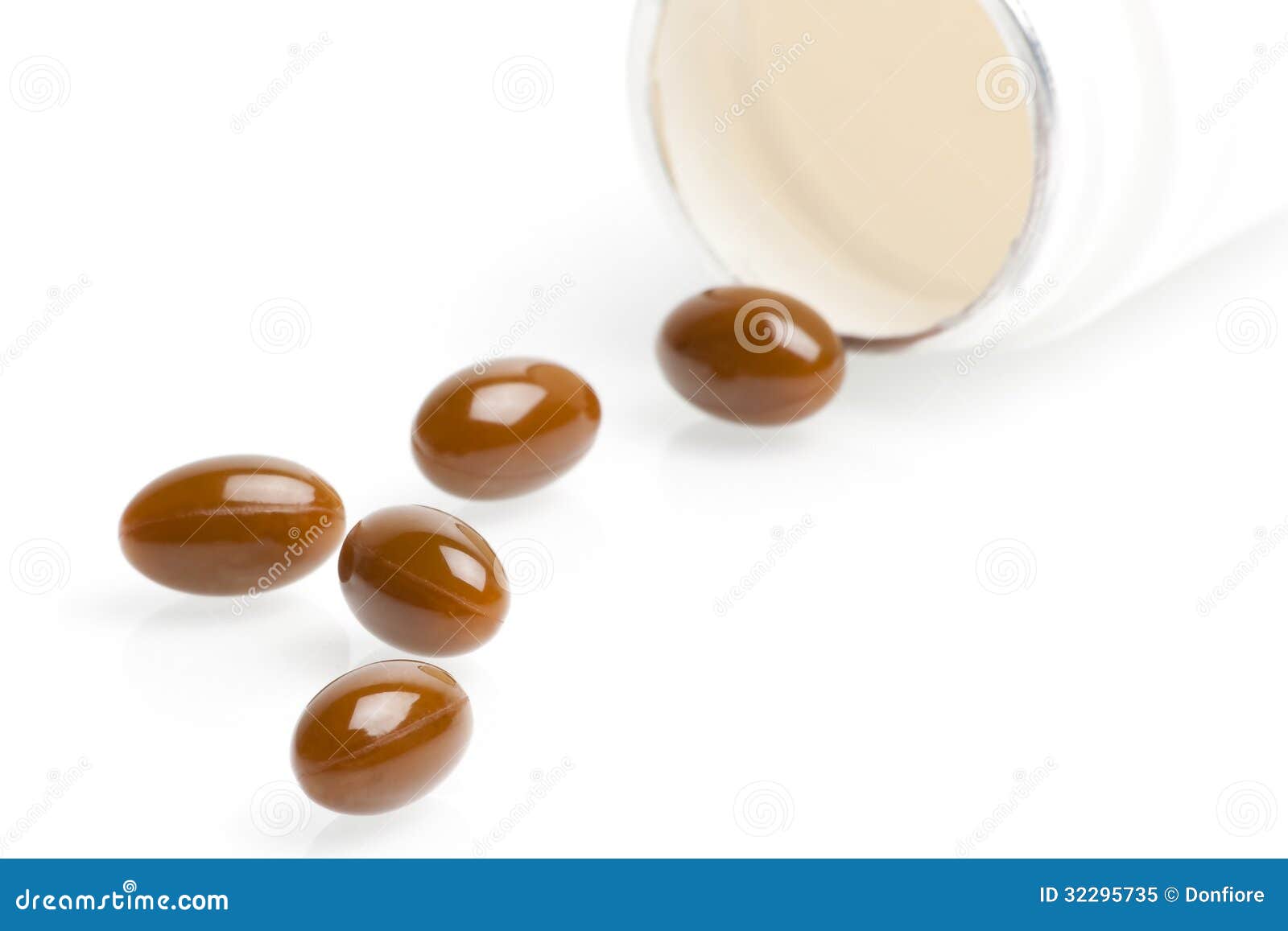 Brown Medical Pills in Laboratory Near White Container Stock Image