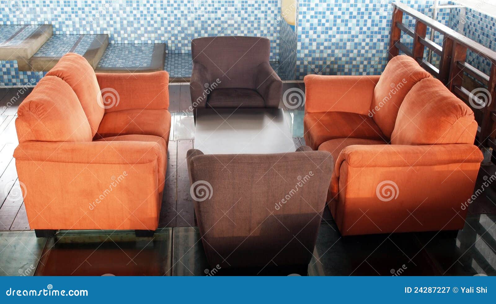 Brown and Orange Couches stock image. Image of orange 24287227