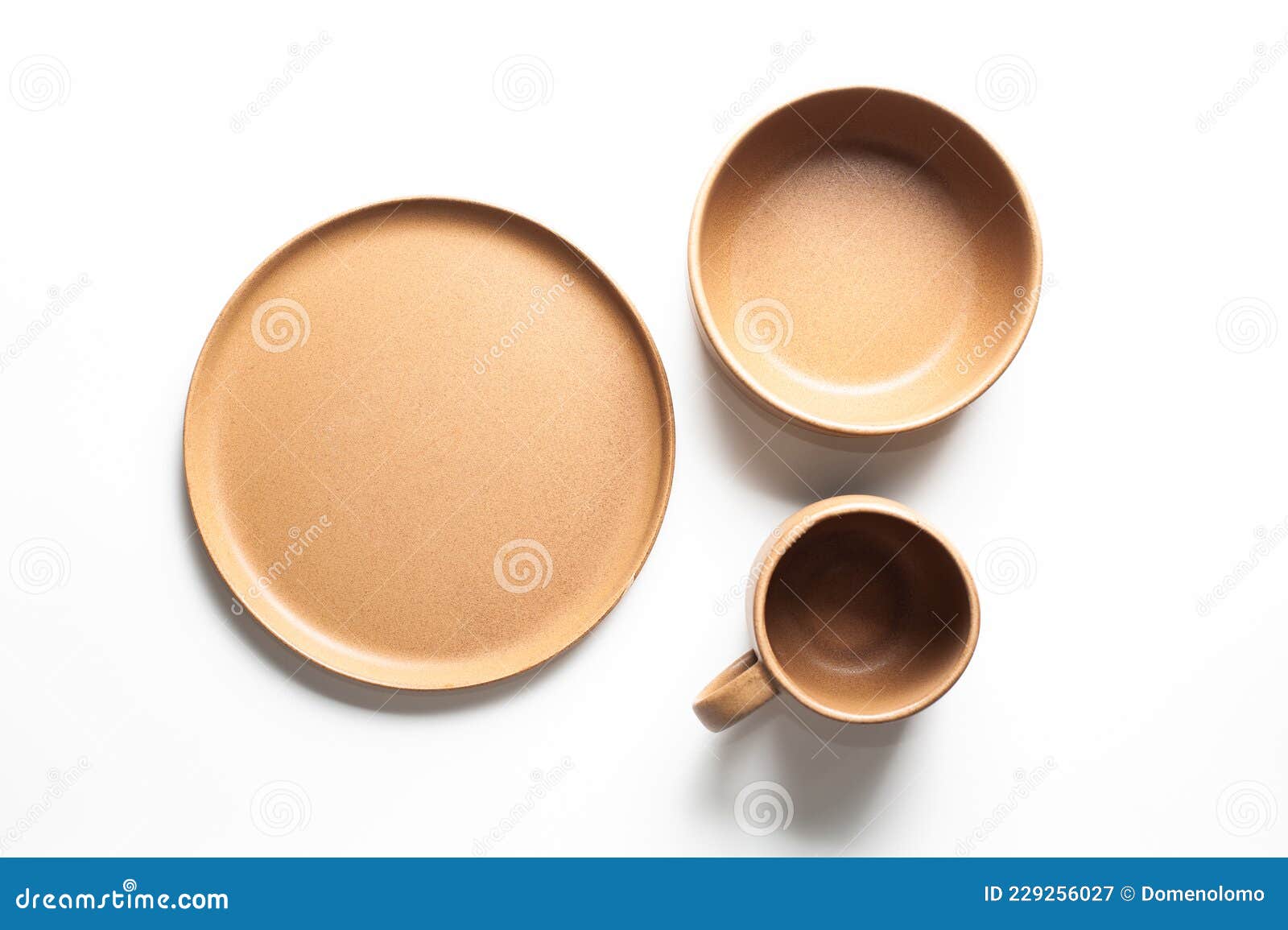 Brown Pottery Coffee Cup, Bowl and Plate, on White Stock Image Image