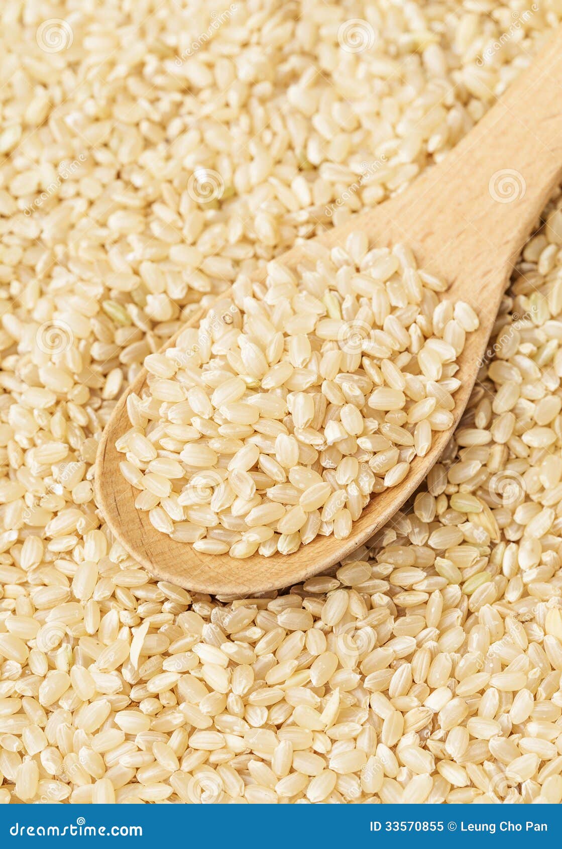 Brown rice and teaspoon stock image. Image of rice, spoon 33570855