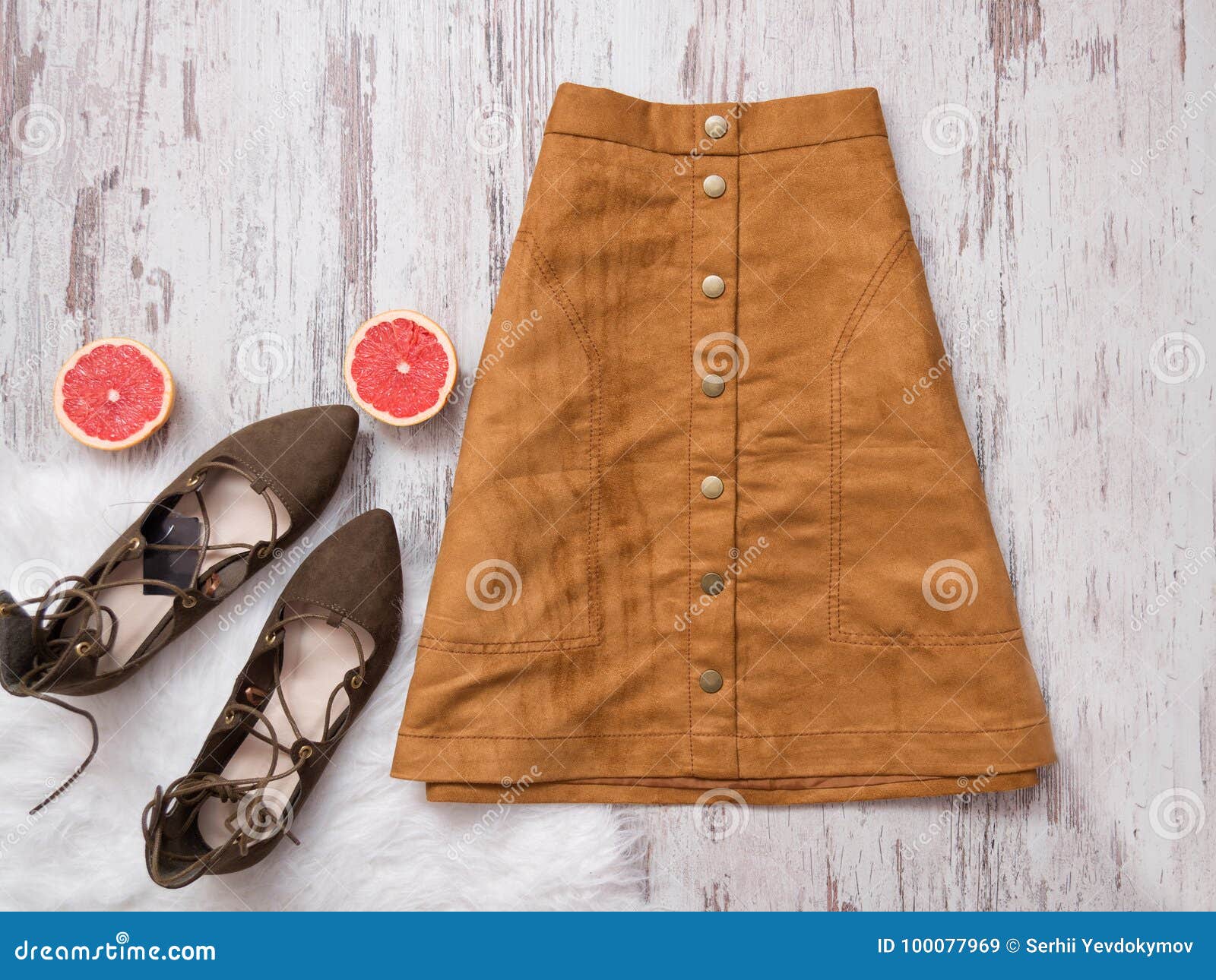 Brown Suede Skirt, Brown Suede Shoes, Cut Grapefruit Halves. Wooden ...