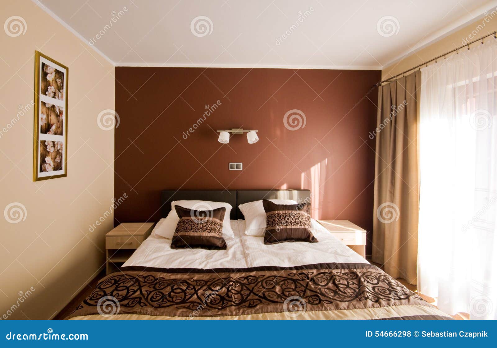 Brown theme bedroom stock photo. Image of lighting, natural 54666298