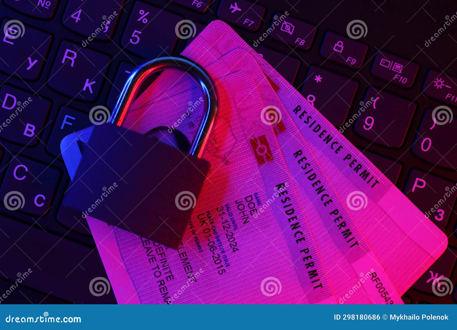 brp residence permit card with small padlock on computer keyboard