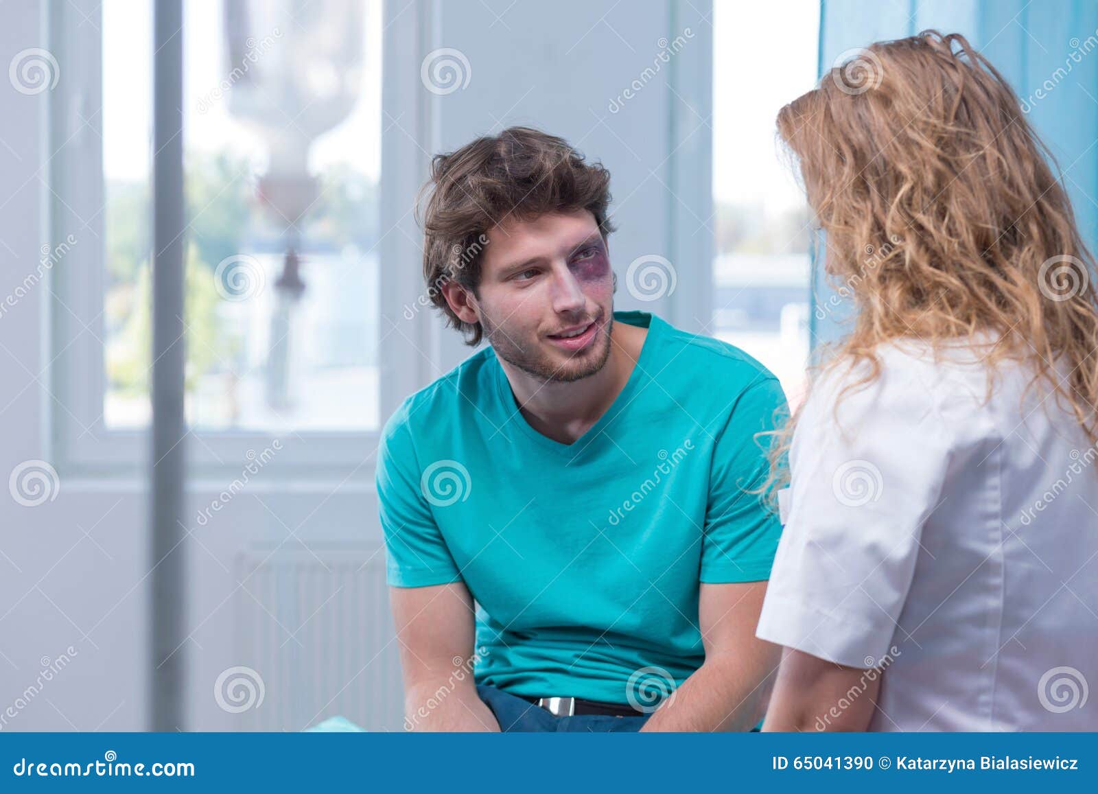 Bruised Man Flirting with Nurse Stock Photo Image of male, shiner