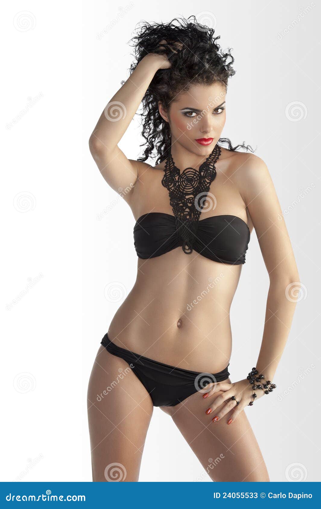 brunette girl posing in fashion bikini