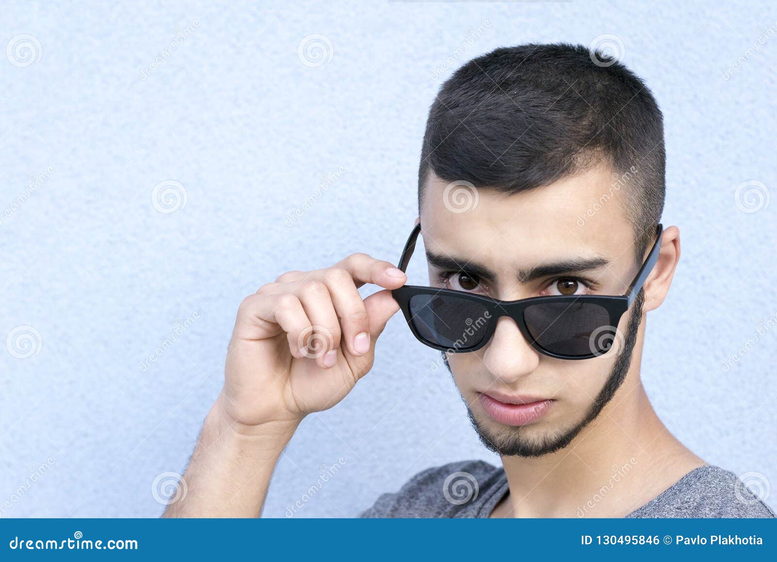 Brunette Guy Looking with Serious Glance Stock Photo - Image of grey ...