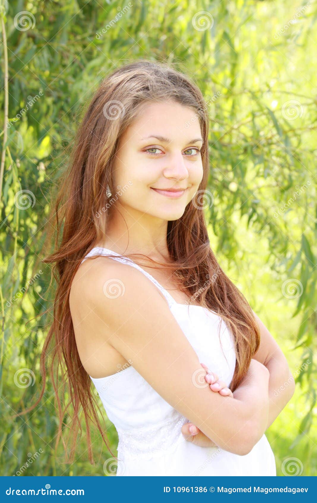 Brunette Holding Arms Folded Stock Photo - Image of green, people: 10961386