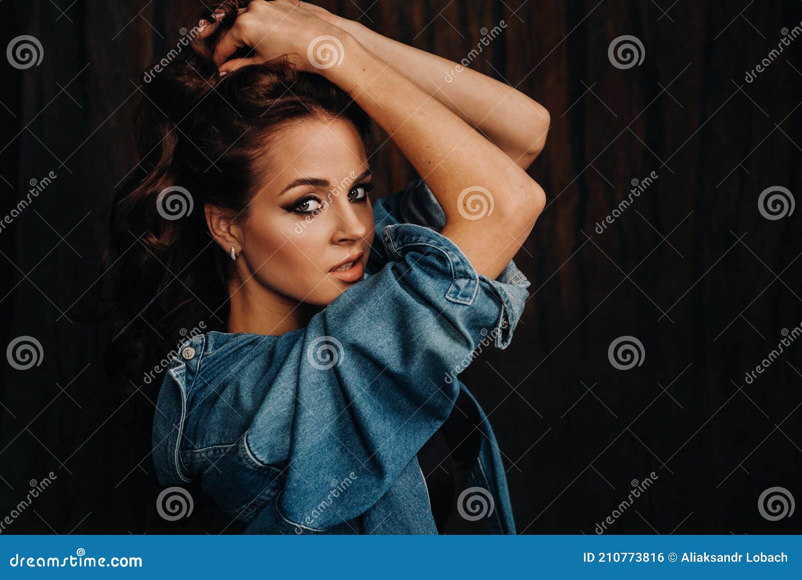 A Brunette with Long Hair Poses in a Studio Sitting on the Floor on a Black Background Stock Photo - Image of fashion, face: 210773816 A Brunette with Long Hair Poses in a Studio Sitting on the Floor on a Black Background Stock Photo - Image of fashion, face: 210773816