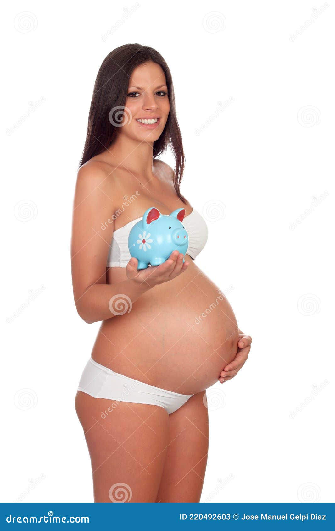 Pregnant woman in underwear covering face with - Stock Photo