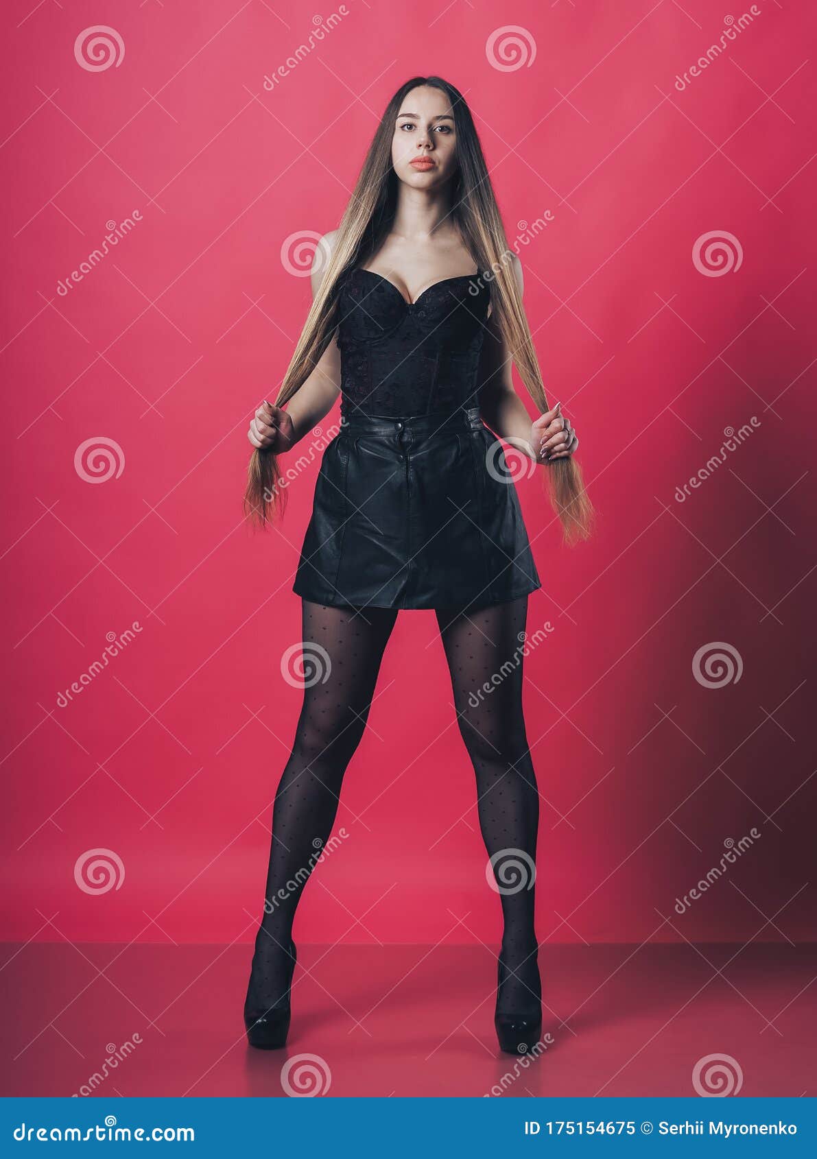 Brunette Girl Posing at the Pink Background Stock Image - Image of ...