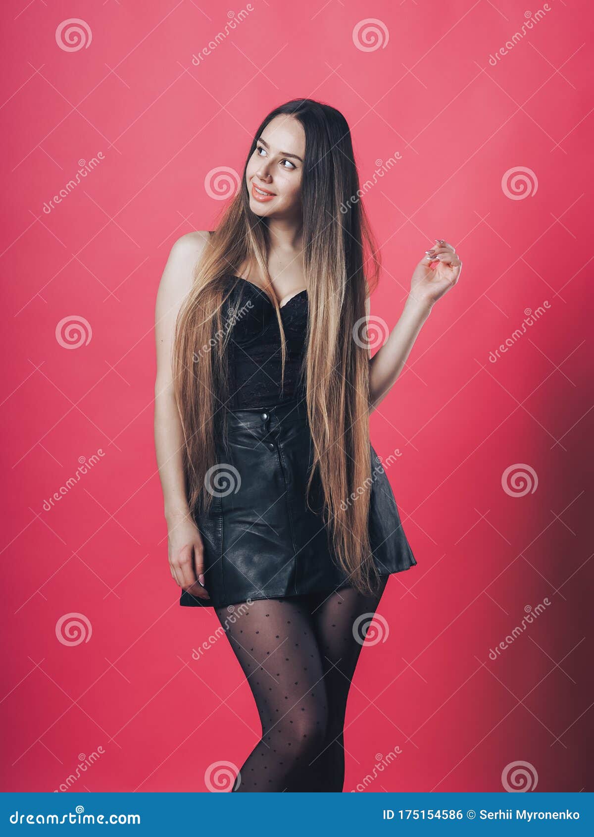 Brunette Girl Posing At The Pink Background Stock Photo - Image of ...