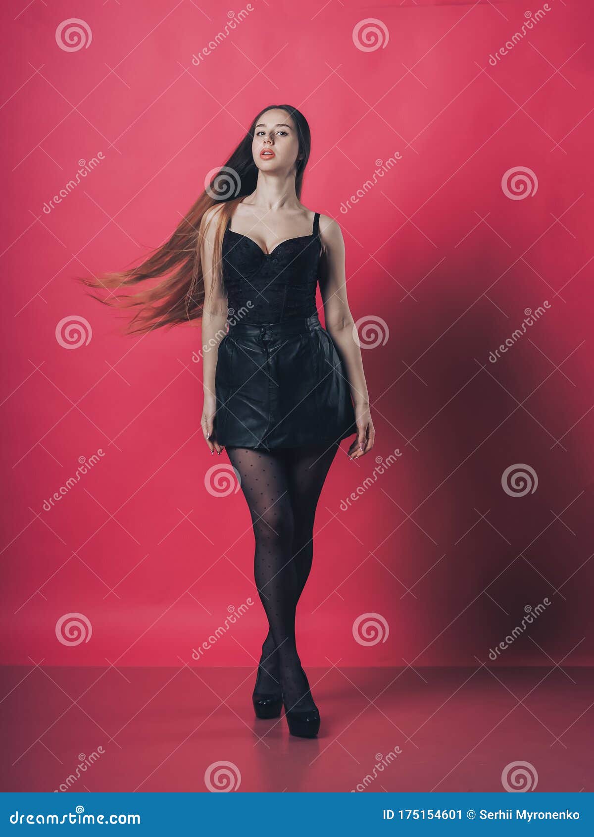 Brunette Girl Posing at the Pink Background Stock Image - Image of ...