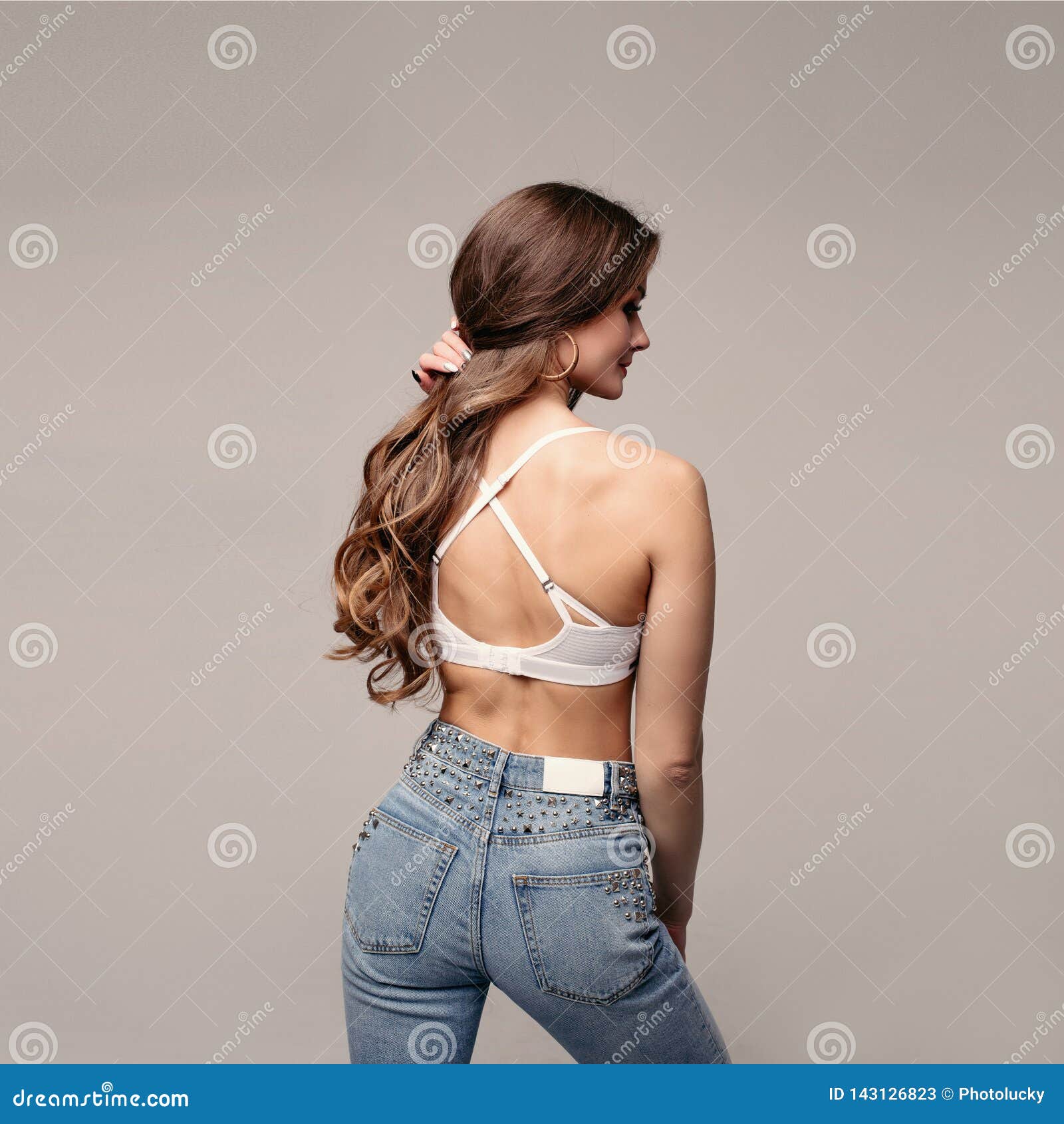 Brunette Slim Model in Jeans and Sports Bra. Stock Image - Image of  sportswoman, advertisement: 143126823