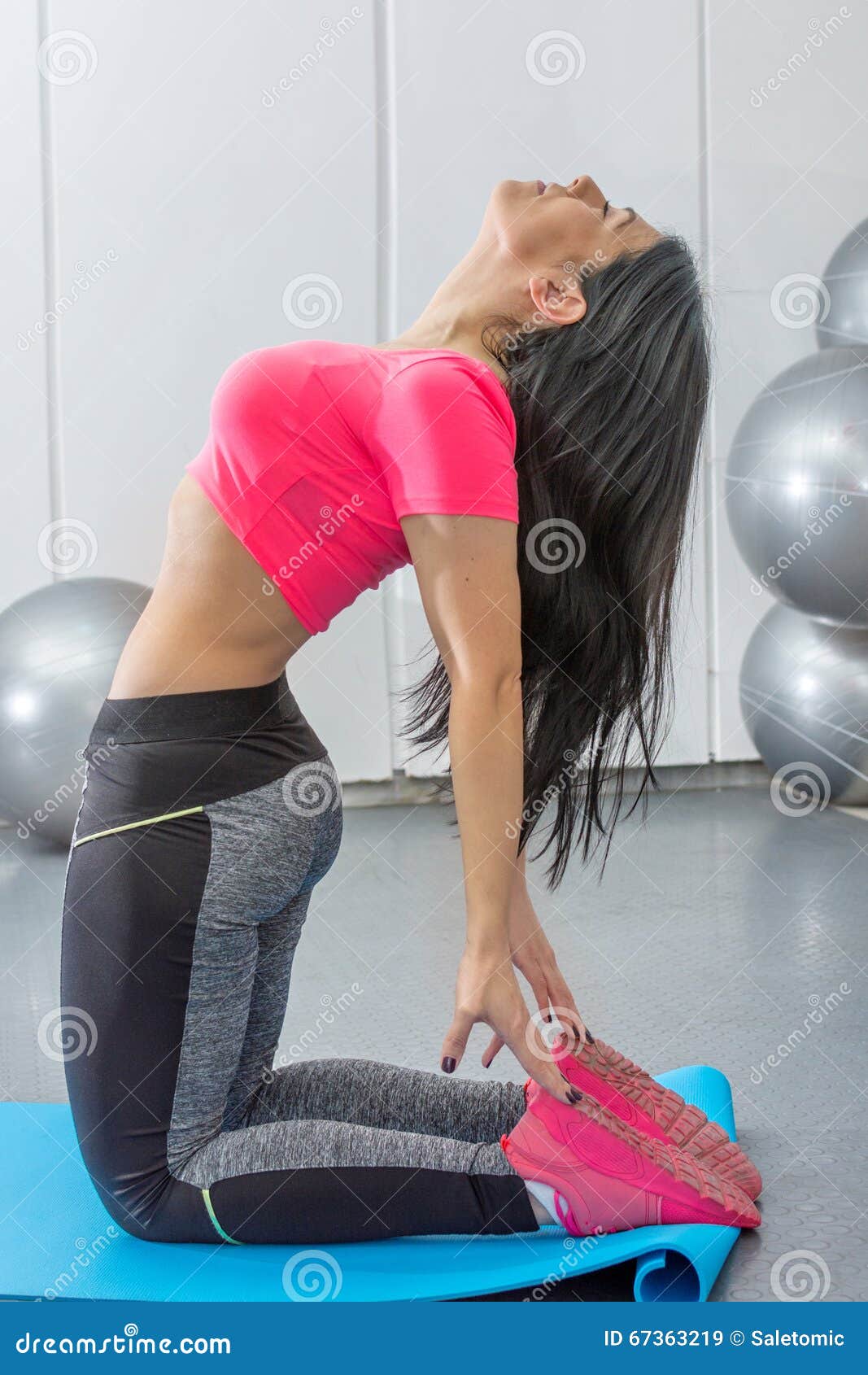 Brunette Stretching On A Mat Stock Image Image Of Healthy Lifestyle