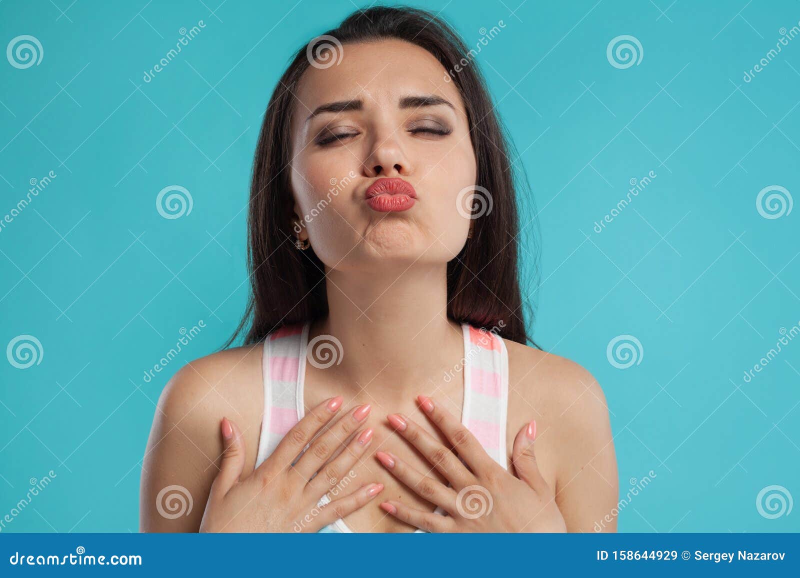 Brunette Woman With Long Hair Dressed In Colorful Striped Shirt