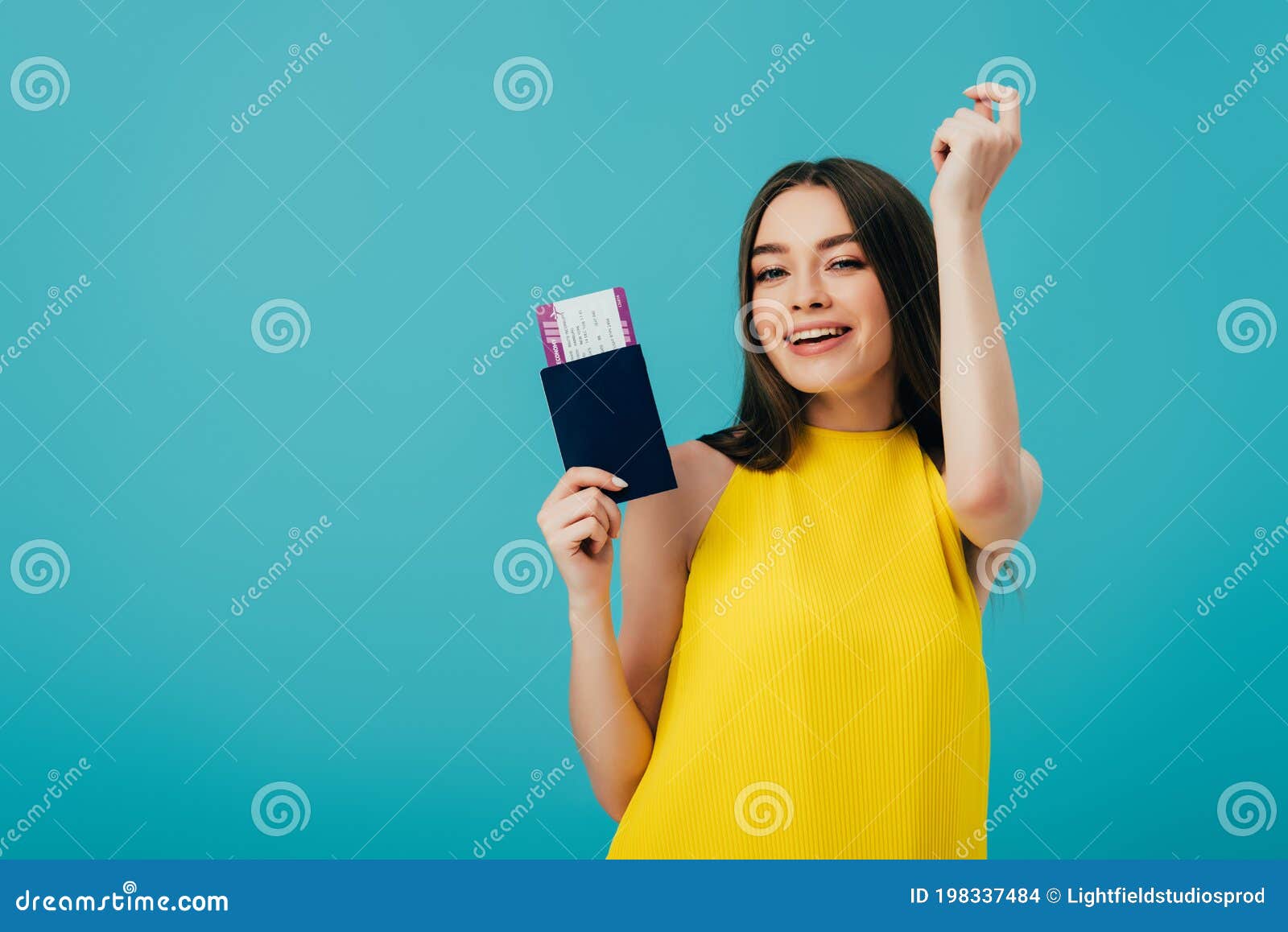 Brunette Woman in Yellow Dress Dancing with Passport with Air Ticket ...