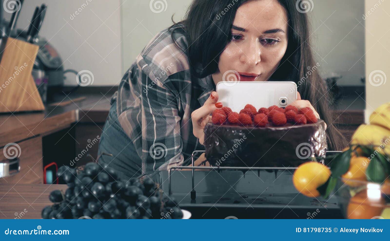 Brunette Young Woman Making Photos And Videos Of Her Raspberry Cake With The Smartphone Amateur Cooking Social Media Stock Image Image Of Kitchen Modern