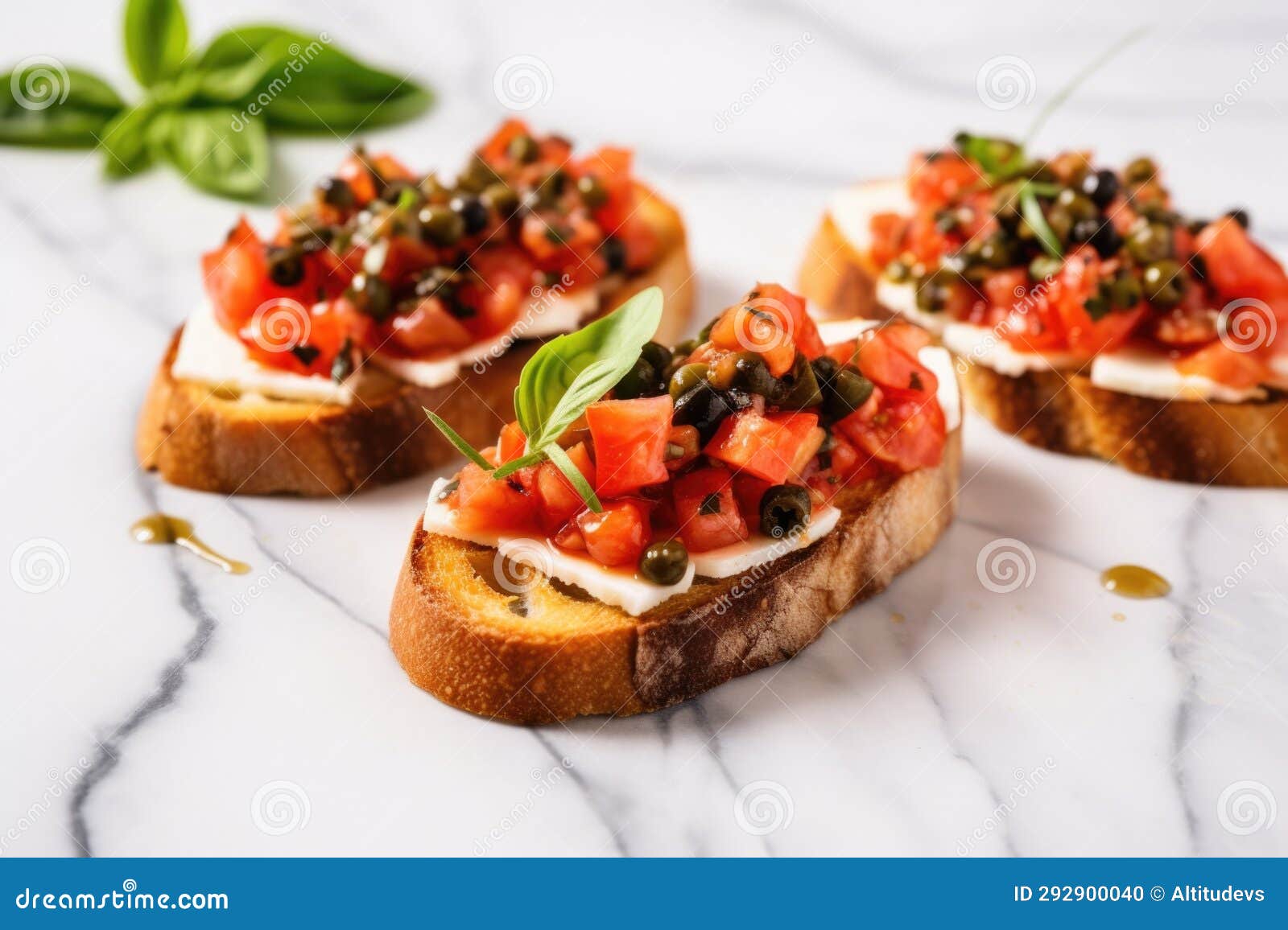 Bruschetta with Capers Placed on a Marble Countertop Stock Photo