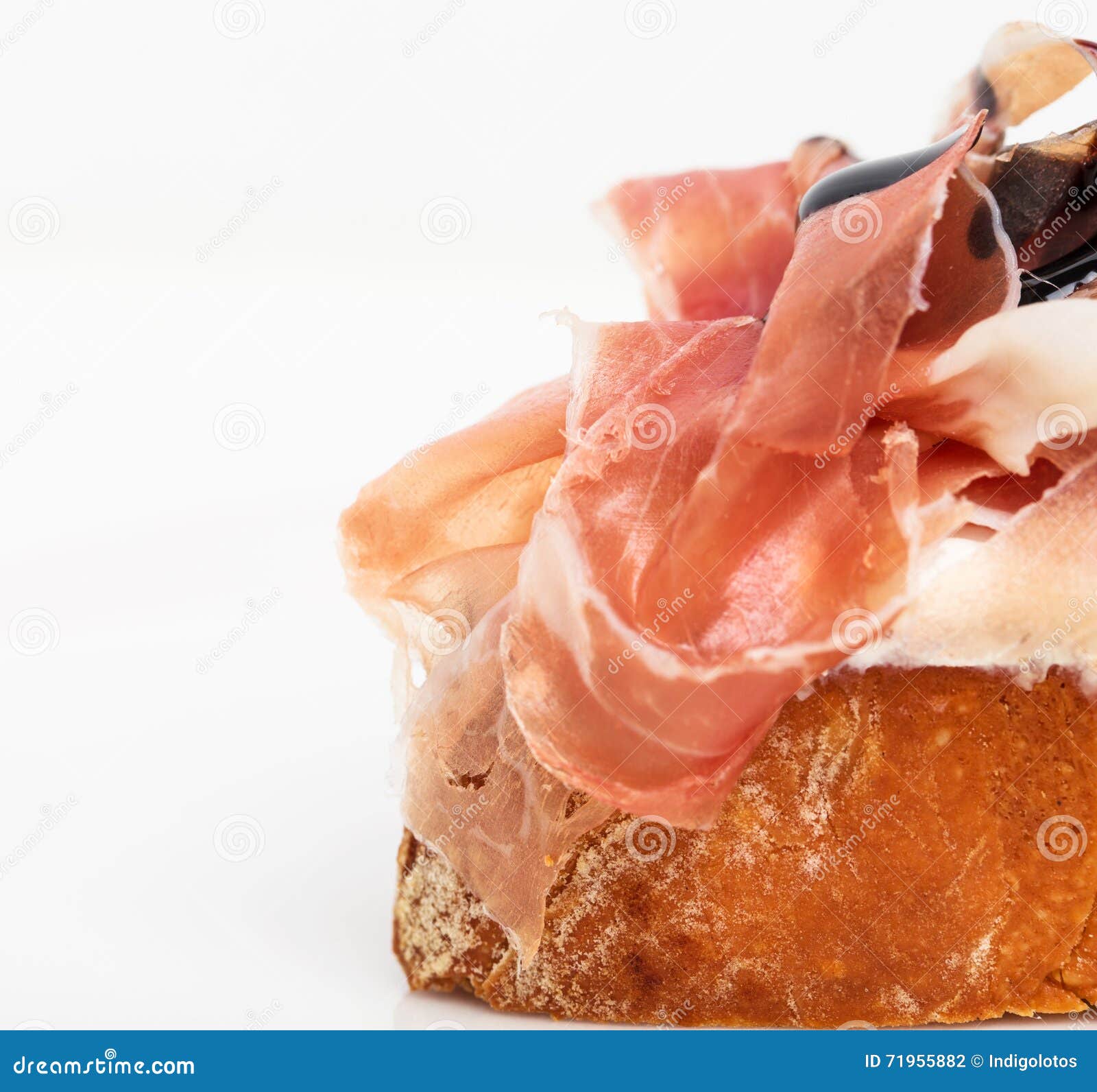 Bruschetta Del Prosciutto Con Ricotta Y Arugula Foto de archivo