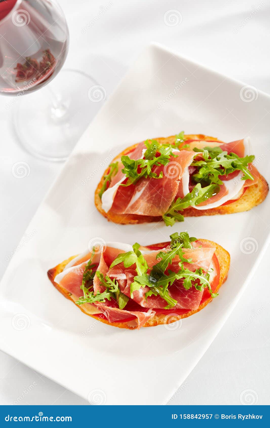 Bruschetta with Parma Ham and Parmesan Cheese. Stock Image Image of
